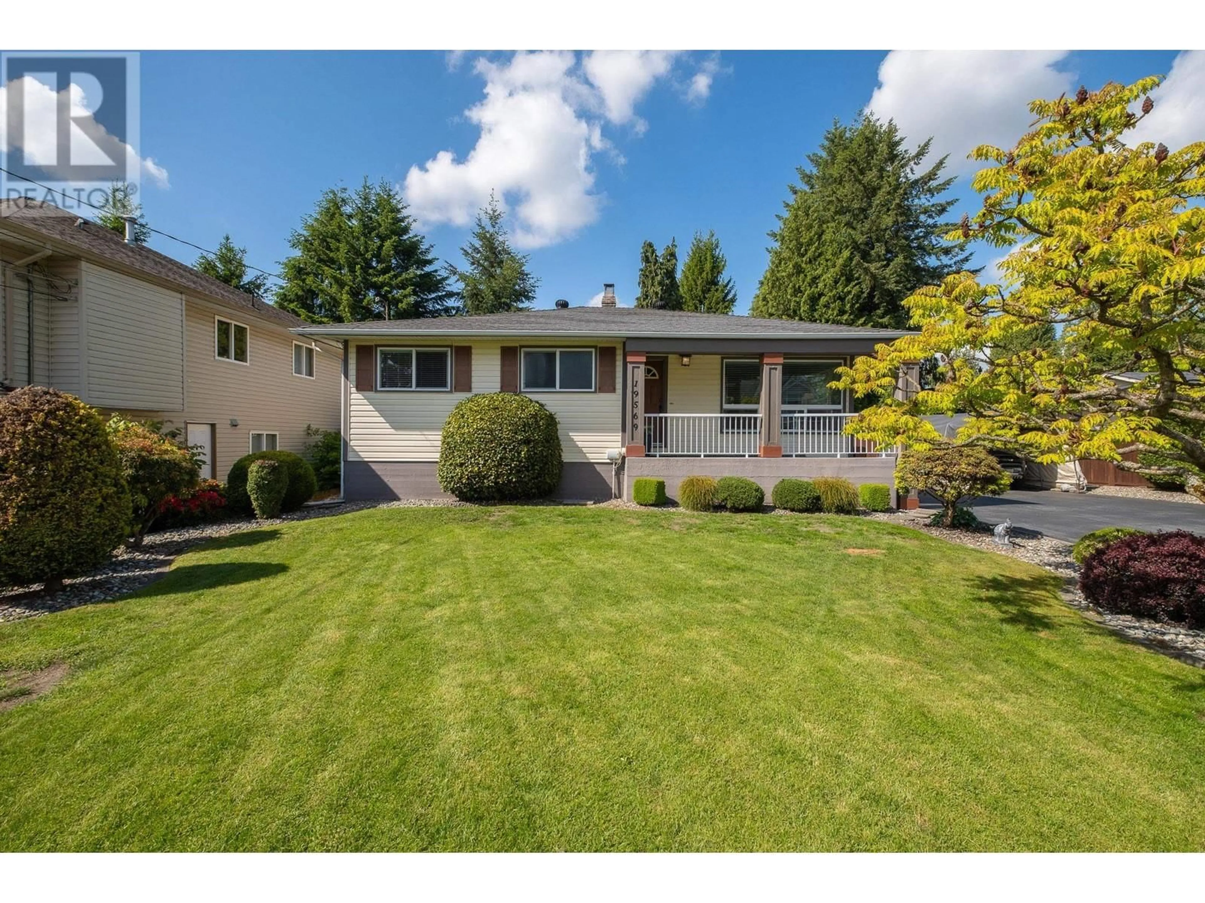 Frontside or backside of a home, the fenced backyard for 19569 116B AVENUE, Pitt Meadows British Columbia V3Y1G2