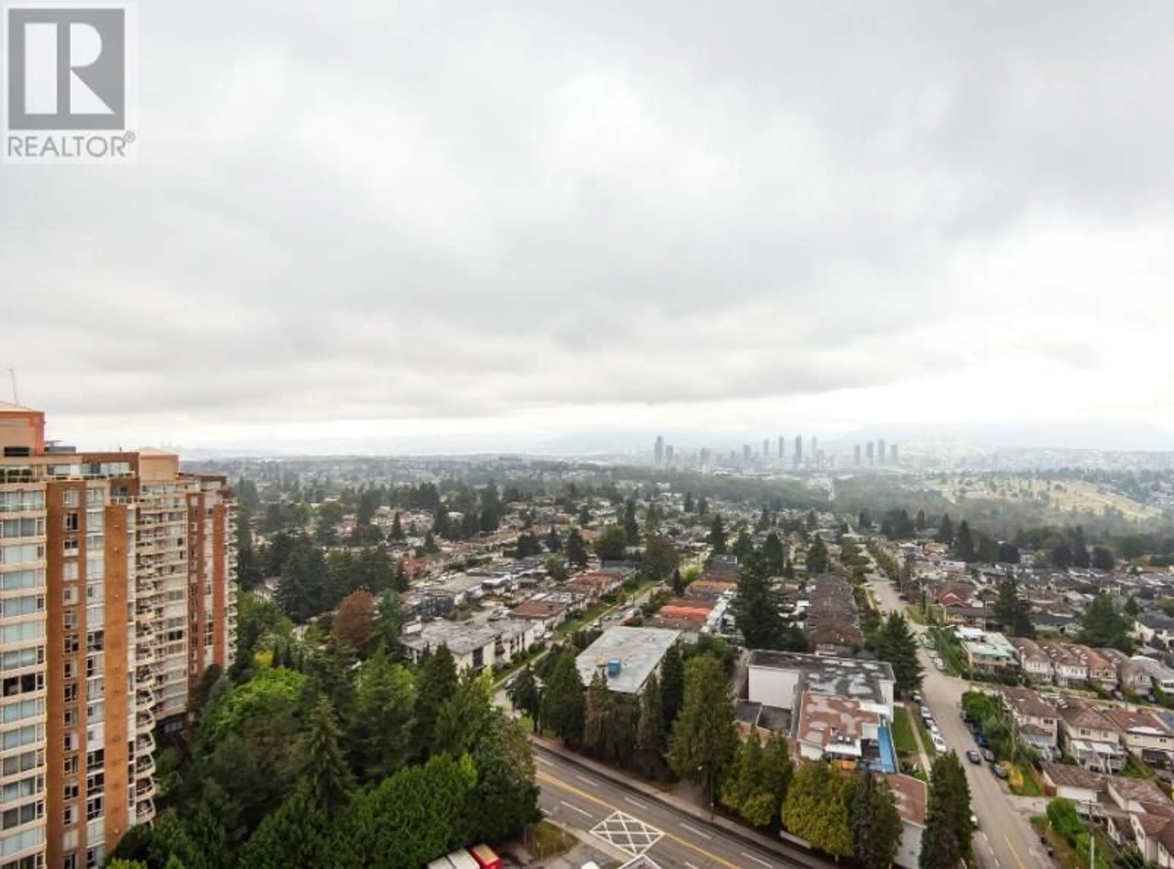 A pic from exterior of the house or condo, the view of city buildings for 1806 4711 HAZEL STREET, Burnaby British Columbia V5H0J9