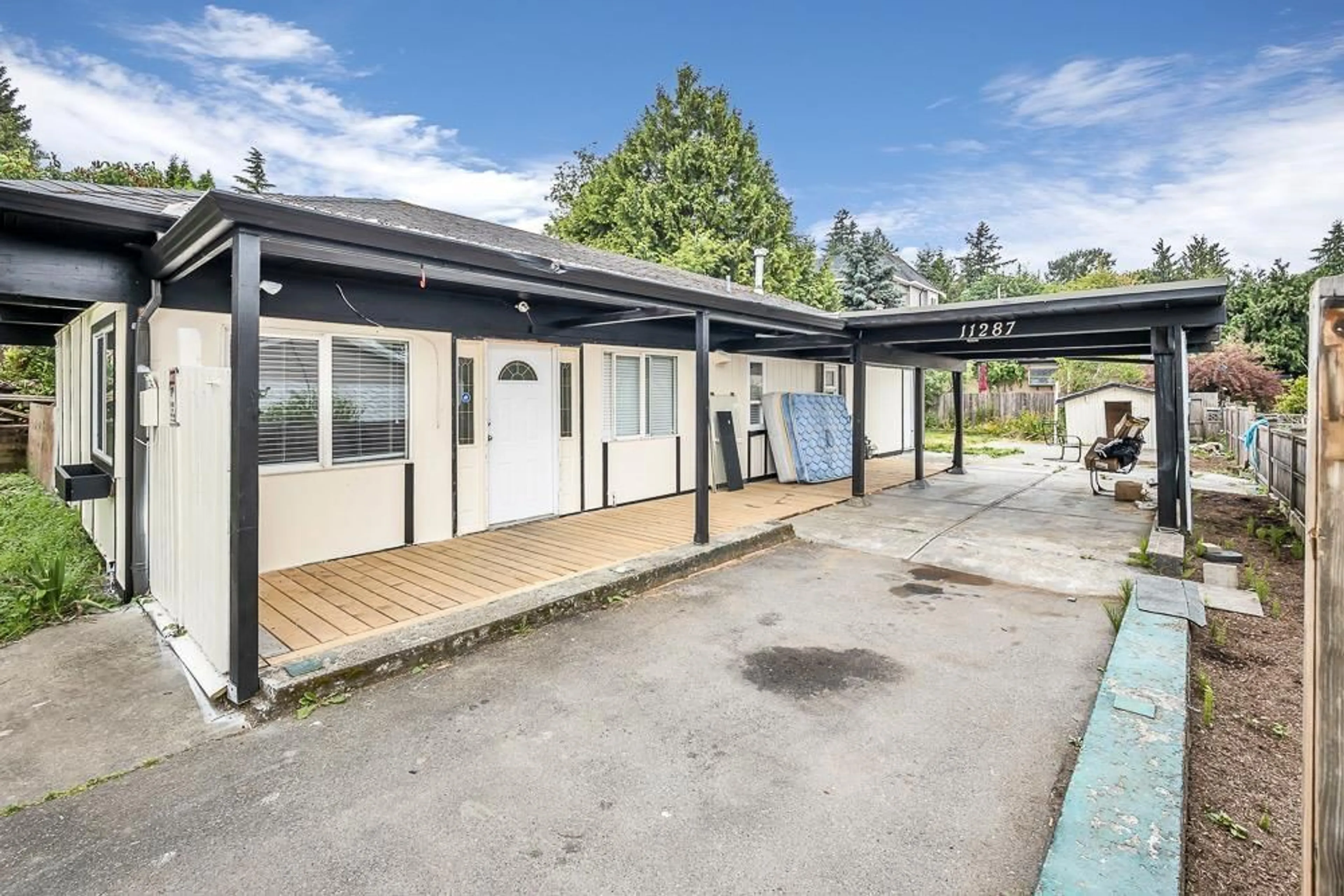 Patio, the front or back of building for 11287 134 STREET, Surrey British Columbia V3R2Z2