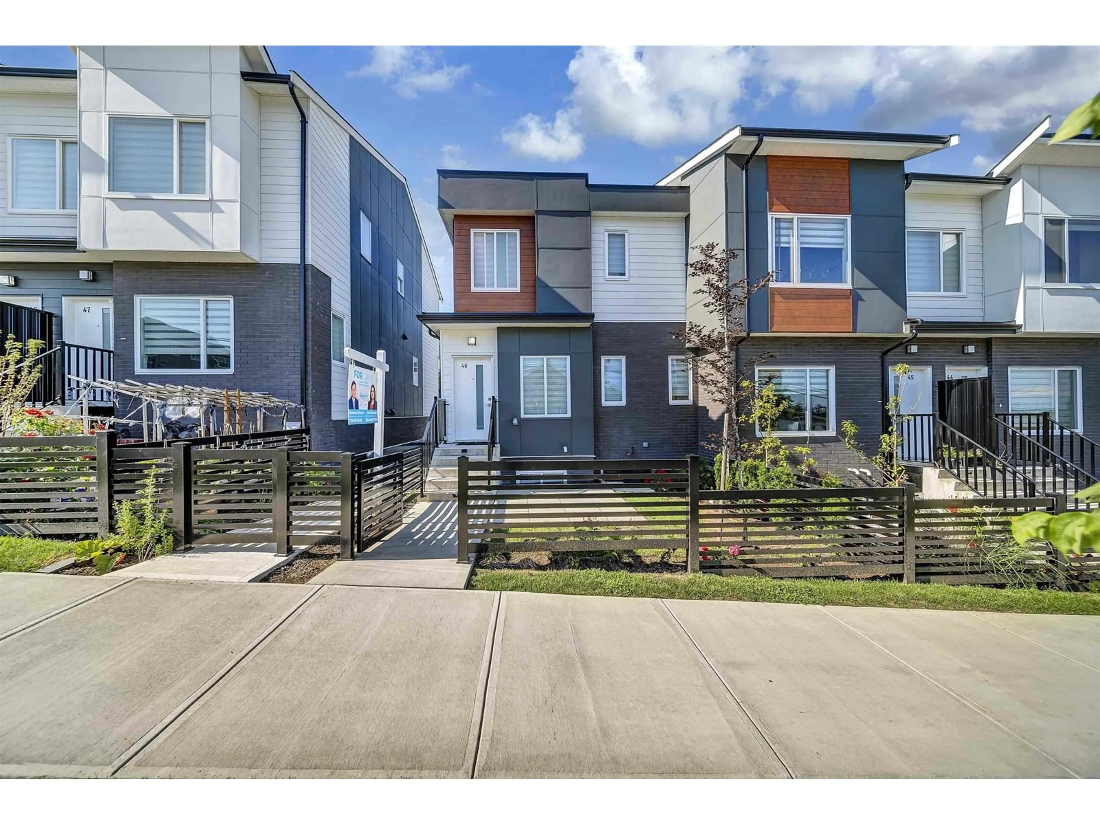 A pic from exterior of the house or condo, the fenced backyard for 46 9652 162A STREET, Surrey British Columbia V4N2E4