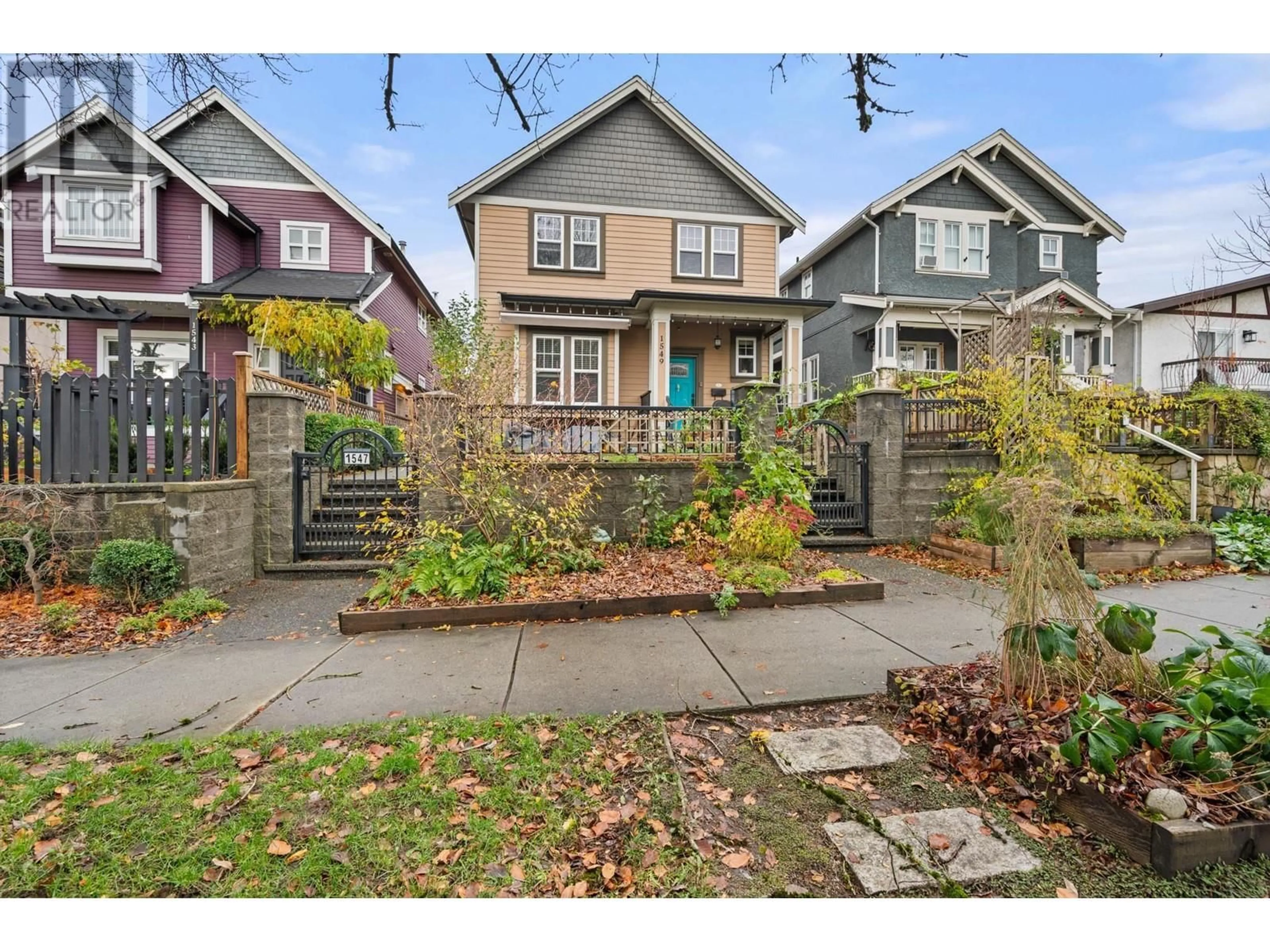 Frontside or backside of a home, the fenced backyard for 1547 E 13TH AVENUE, Vancouver British Columbia V5N2B8