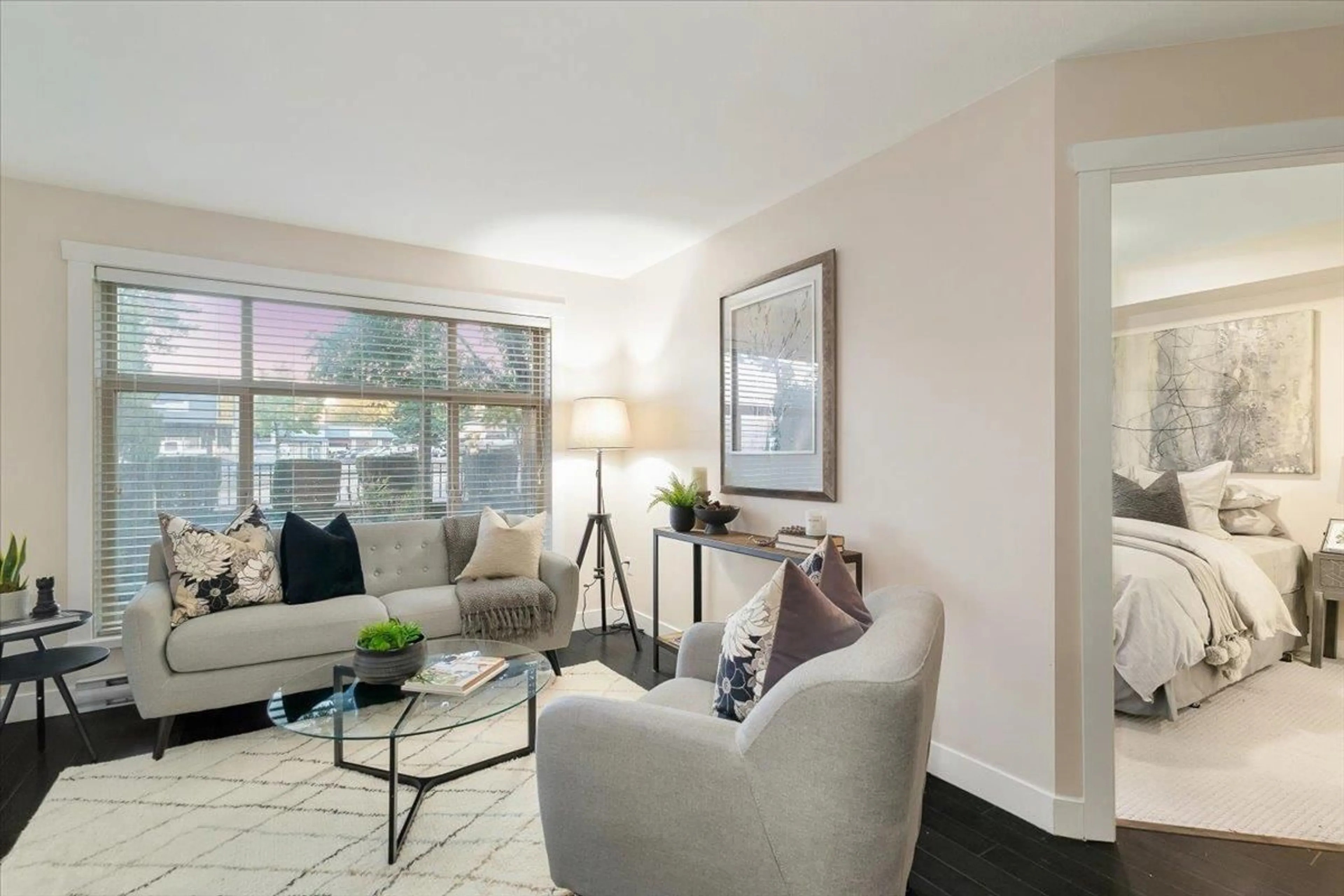 Living room, wood floors for L106 13555 GATEWAY DRIVE, Surrey British Columbia V3T0B5