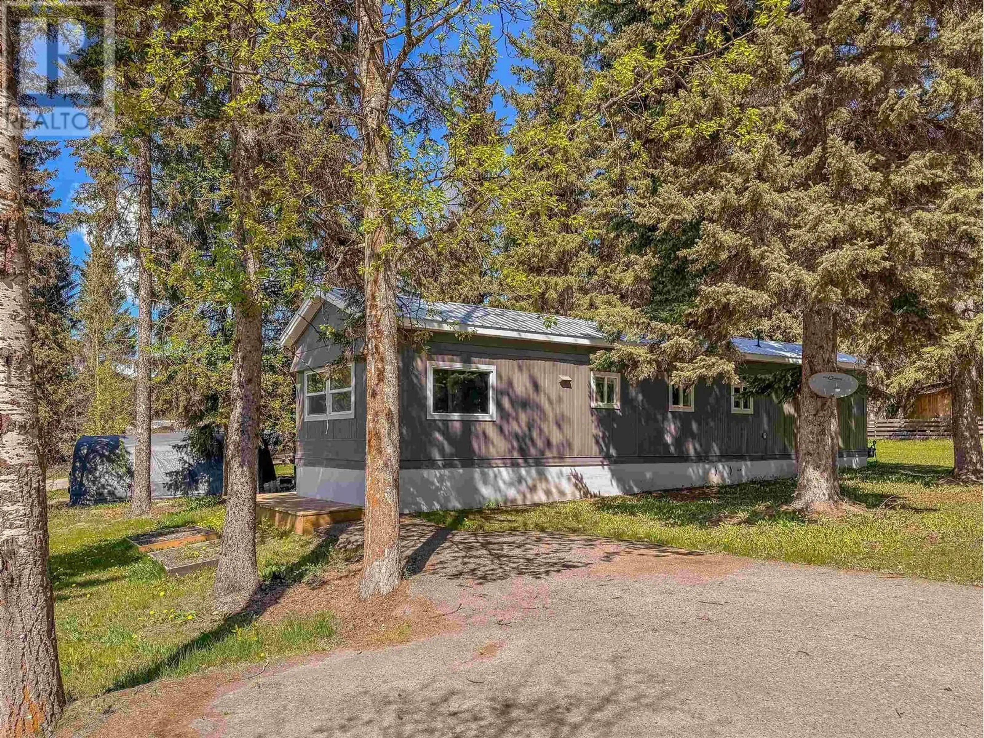 Home with vinyl exterior material, street for 81 - 4430 16 HIGHWAY, Smithers British Columbia V0J2N0