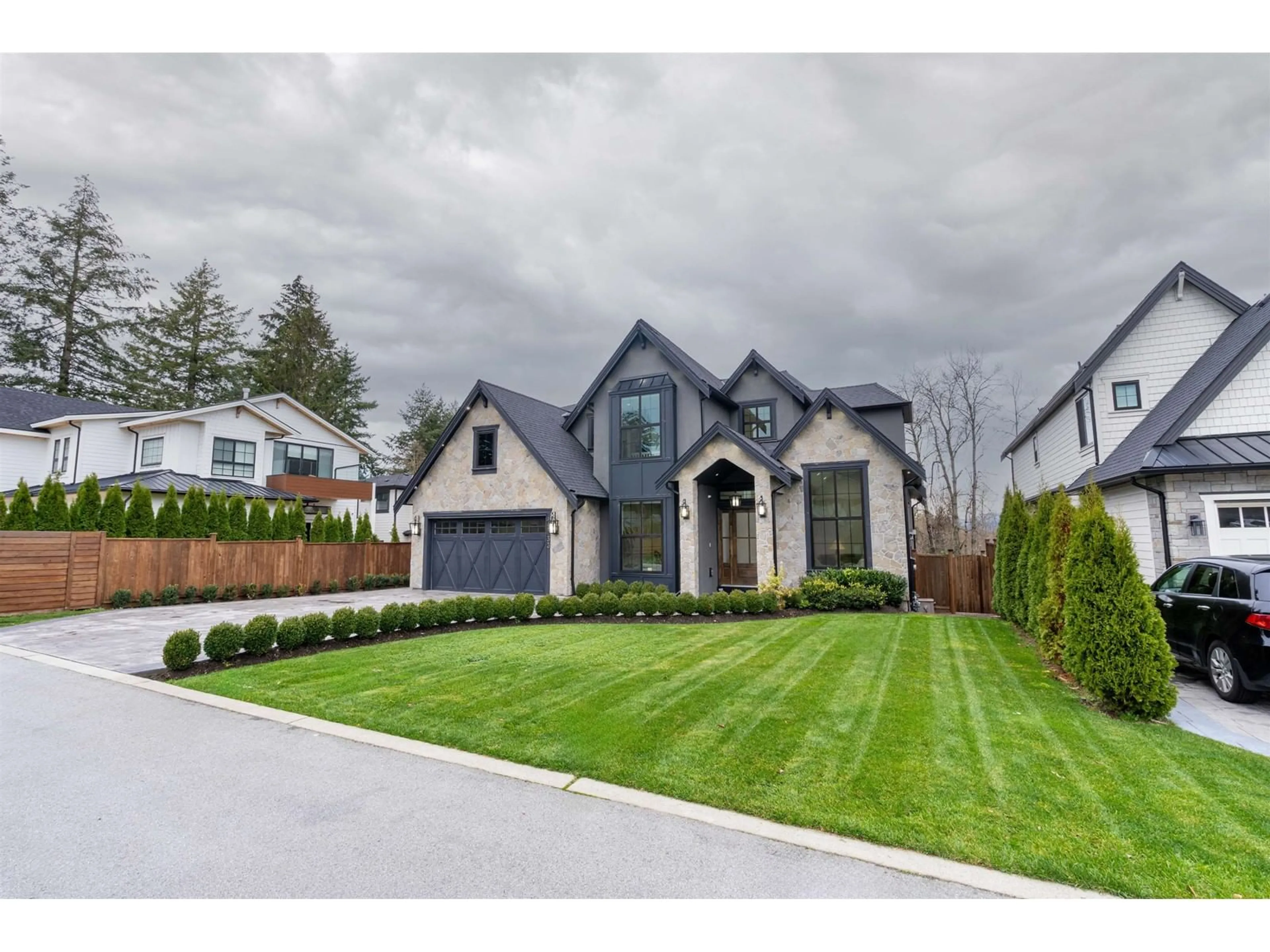 Frontside or backside of a home, the fenced backyard for 16433 29A AVENUE, Surrey British Columbia V3Z0X9