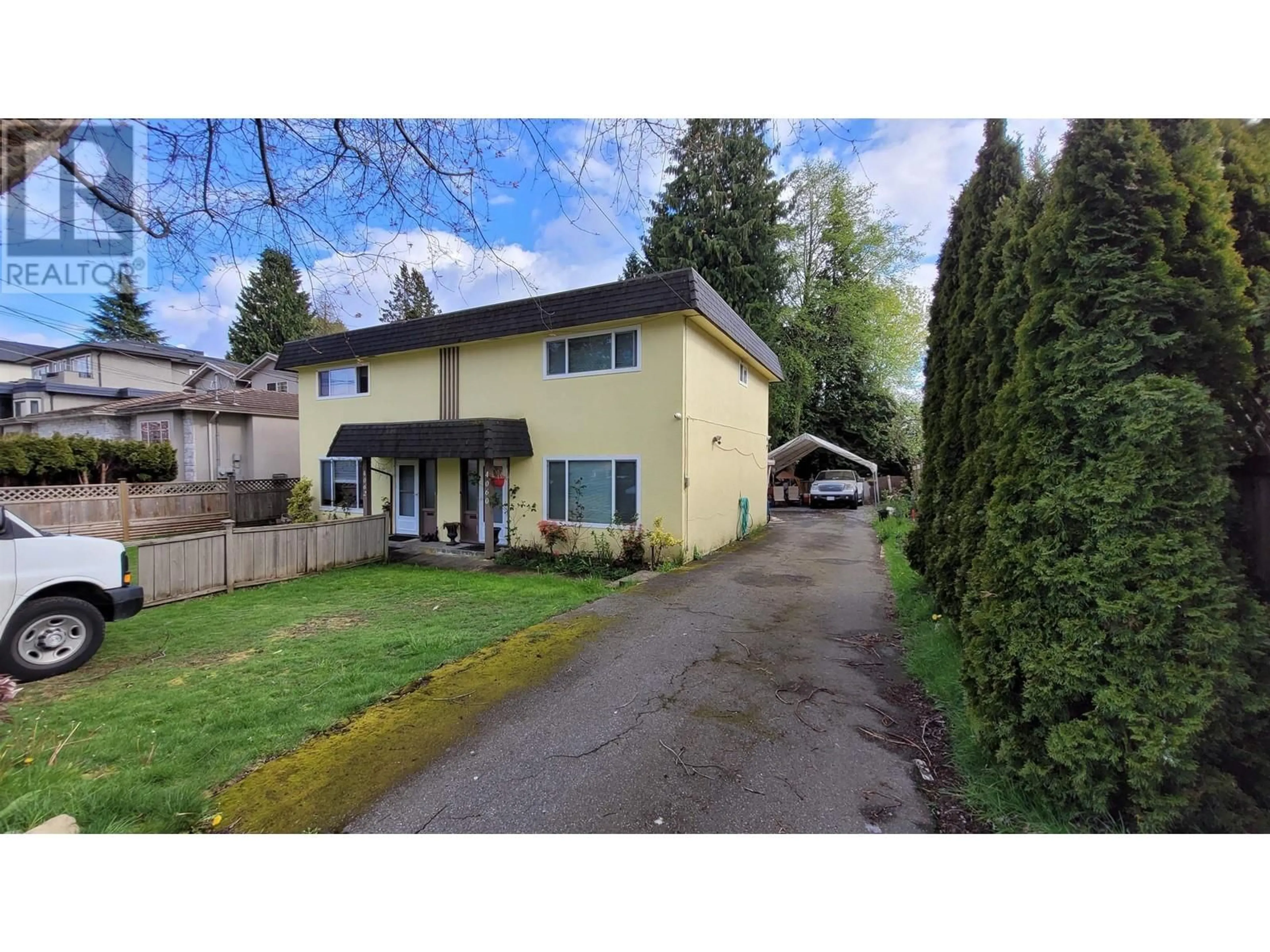 Frontside or backside of a home, the fenced backyard for 4060 FOREST STREET, Burnaby British Columbia V5G1X1