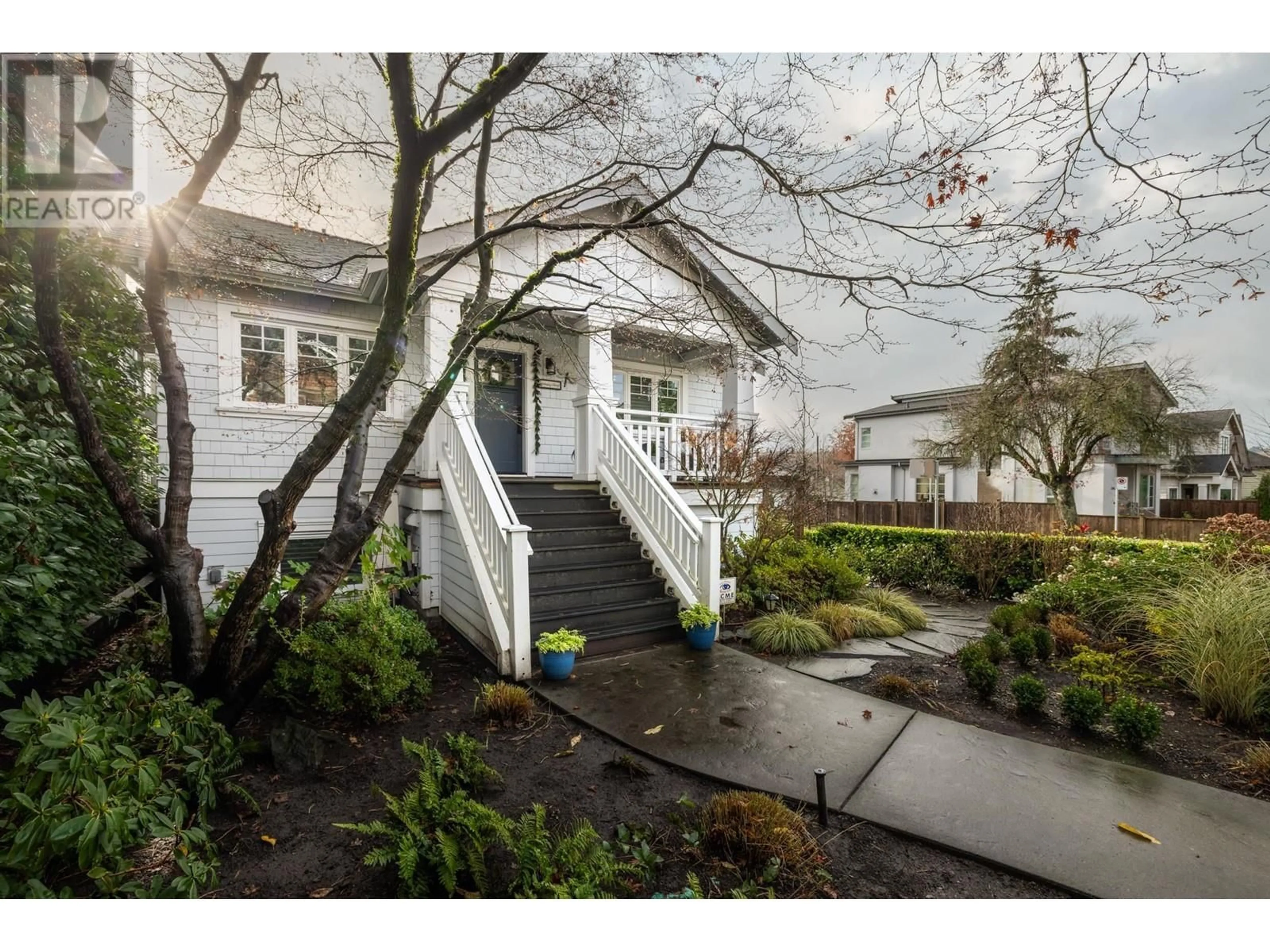 Frontside or backside of a home, cottage for 3696 W 2ND AVENUE, Vancouver British Columbia V6R1J7