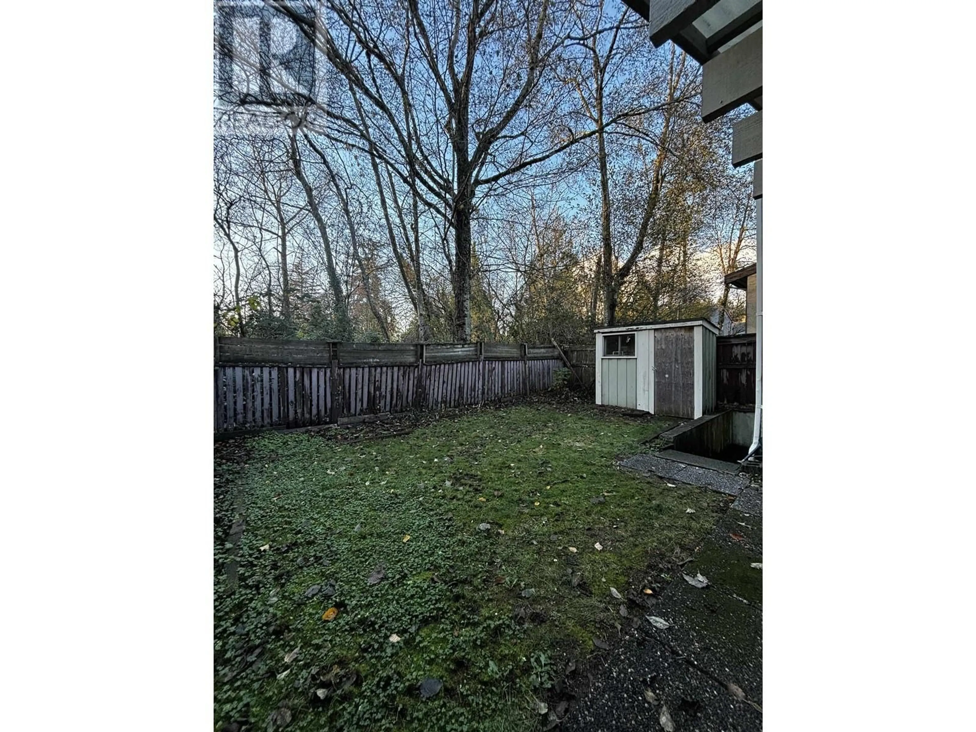 Frontside or backside of a home, the fenced backyard for 6937 LA SALLE STREET, Vancouver British Columbia V5S3W6