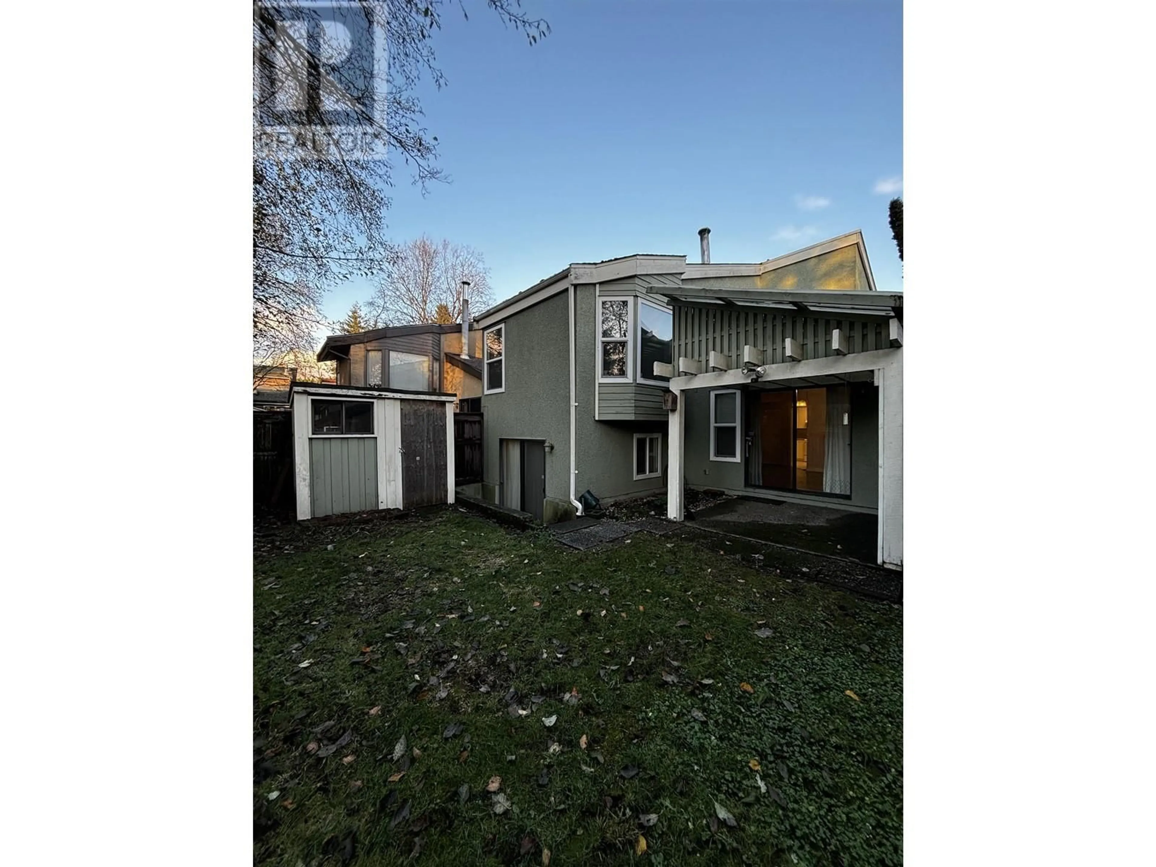 Frontside or backside of a home, the fenced backyard for 6937 LA SALLE STREET, Vancouver British Columbia V5S3W6