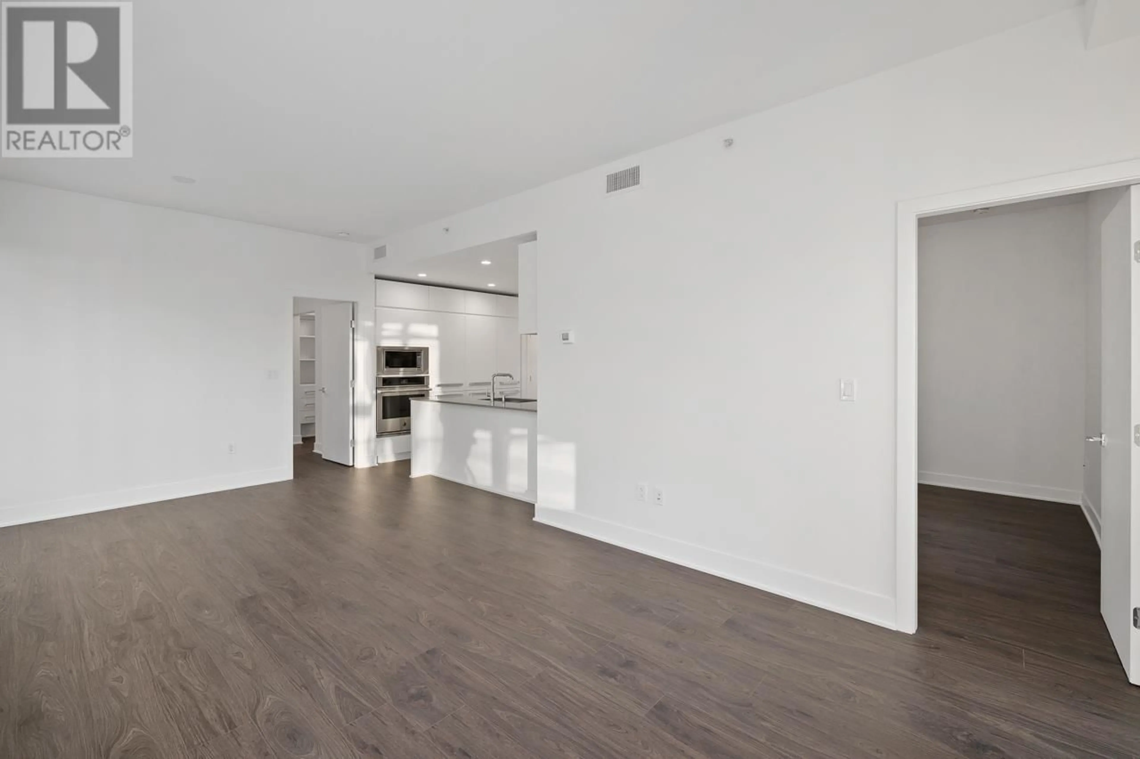 A pic of a room, wood floors for 210 450 WESTVIEW STREET, Coquitlam British Columbia V3K0G3