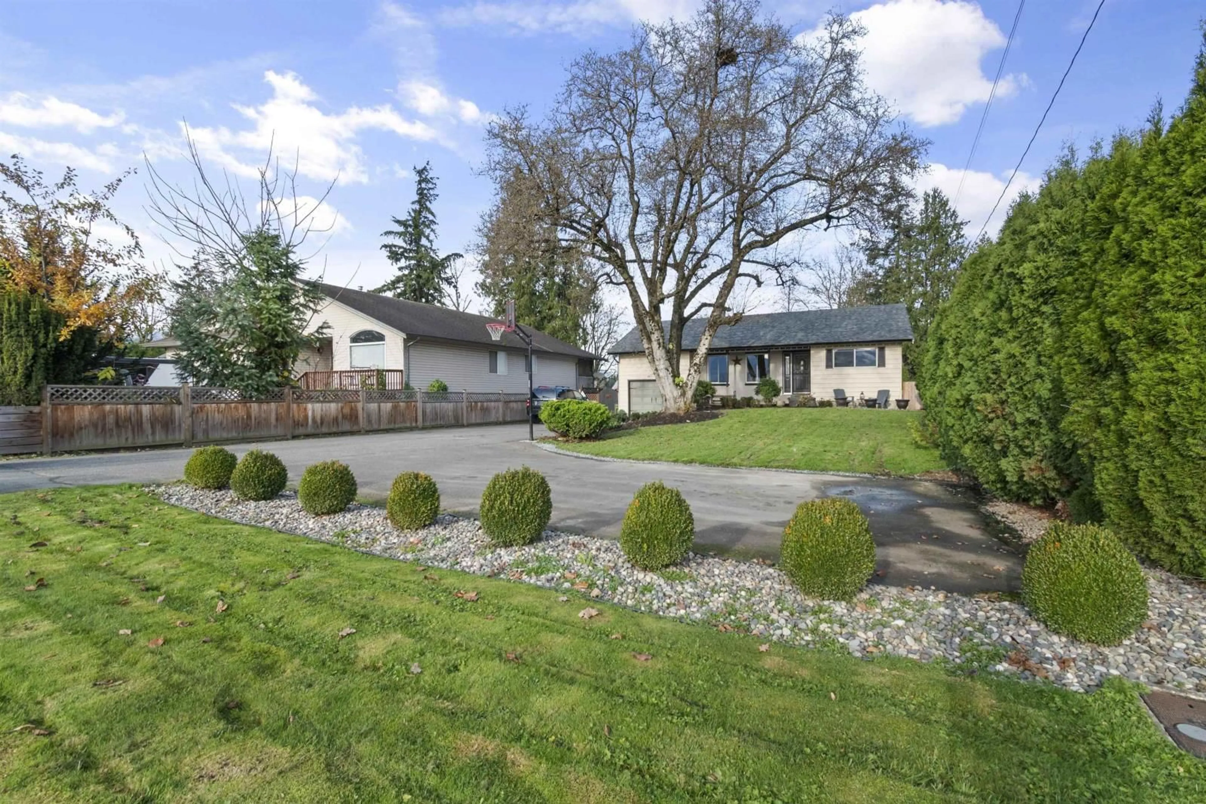 A pic from exterior of the house or condo, the fenced backyard for 48217 YALE ROAD, Chilliwack British Columbia V4Z0A8