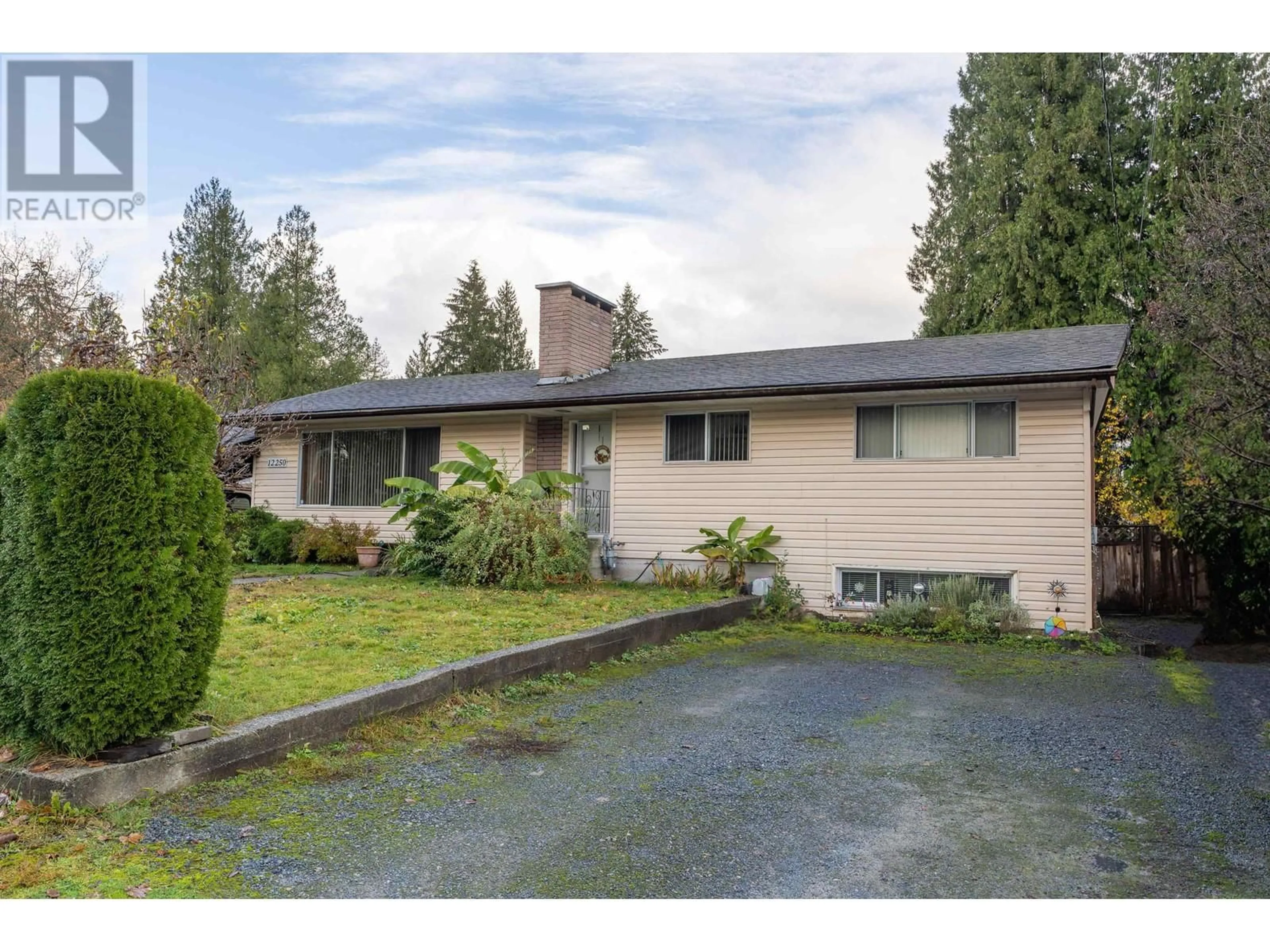 Frontside or backside of a home, the fenced backyard for 12250 SKILLEN STREET, Maple Ridge British Columbia V2X4X3