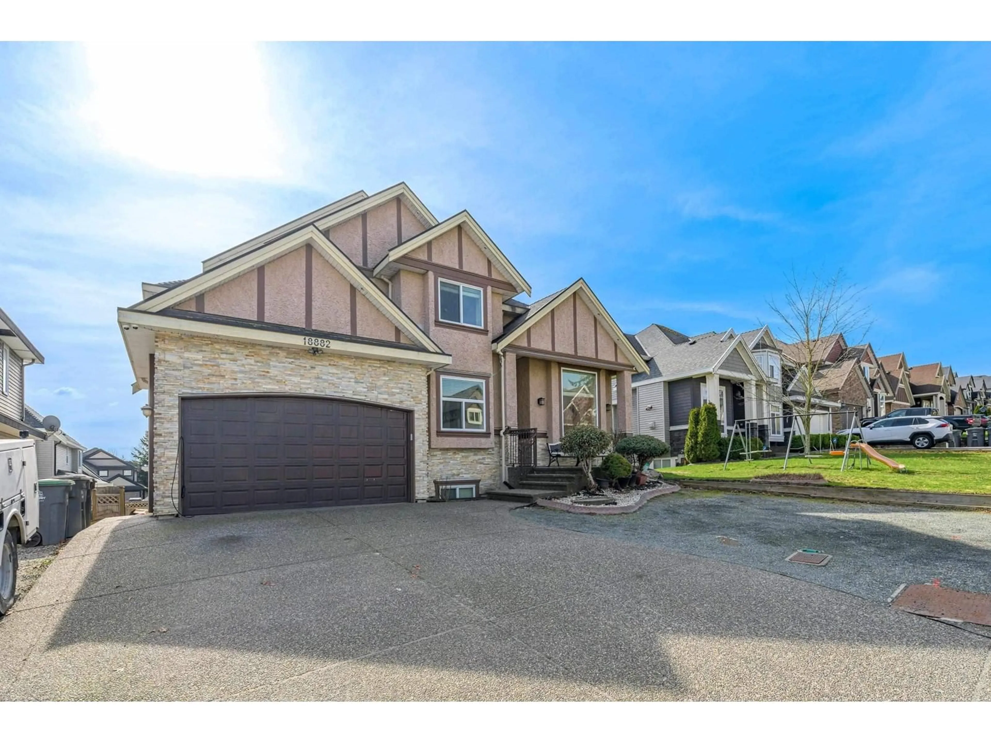 Frontside or backside of a home, the street view for 18882 54 AVENUE, Surrey British Columbia V3S2K2