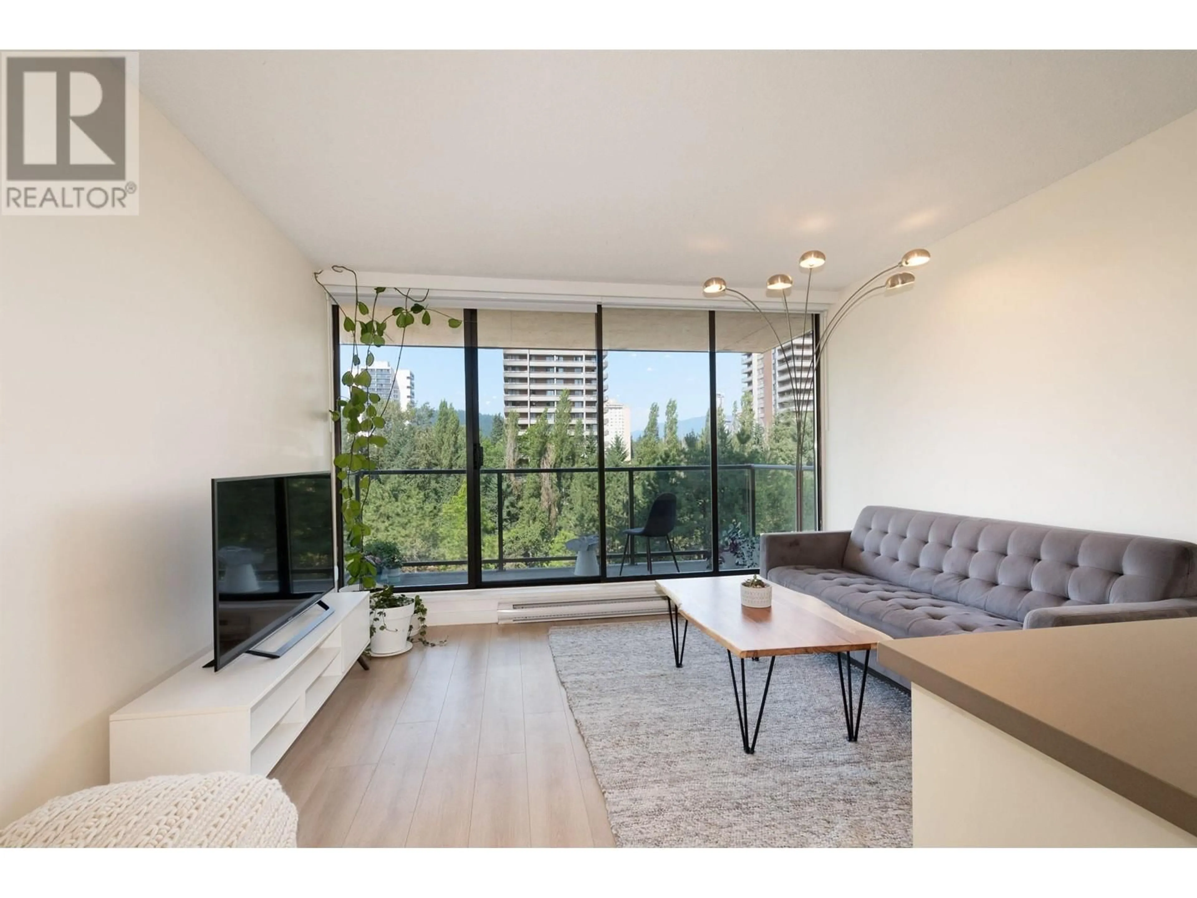 Living room, wood floors for 907 3970 CARRIGAN COURT, Burnaby British Columbia V3N4S5