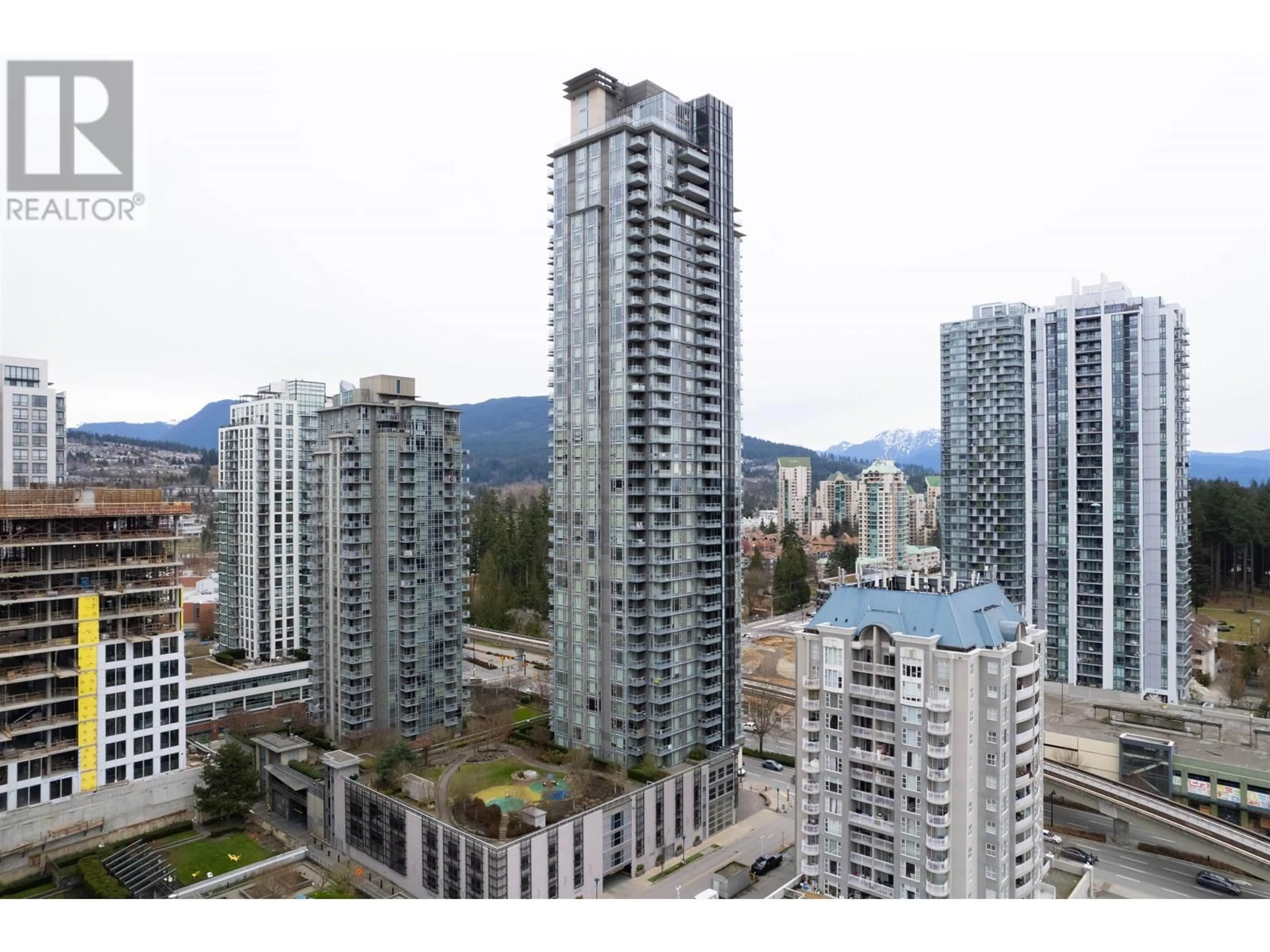 A pic from exterior of the house or condo, the view of city buildings for 2009 1188 PINETREE WAY, Coquitlam British Columbia V3B0K9