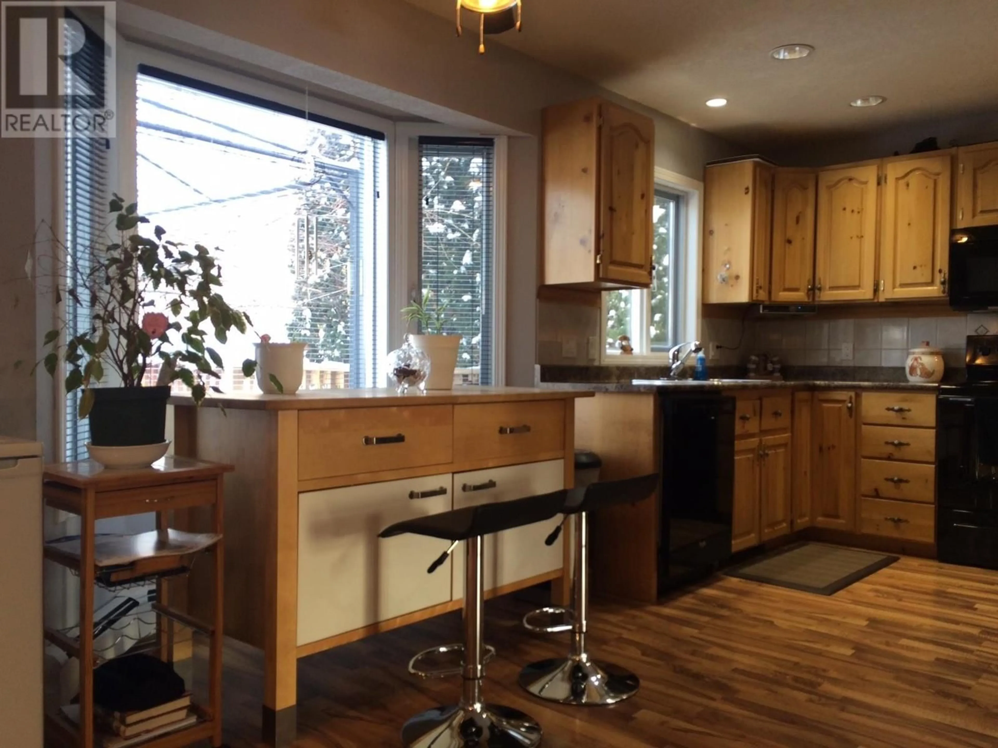 Open concept kitchen for 5520 TUCHODI AVENUE, Fort Nelson British Columbia V0C1R0