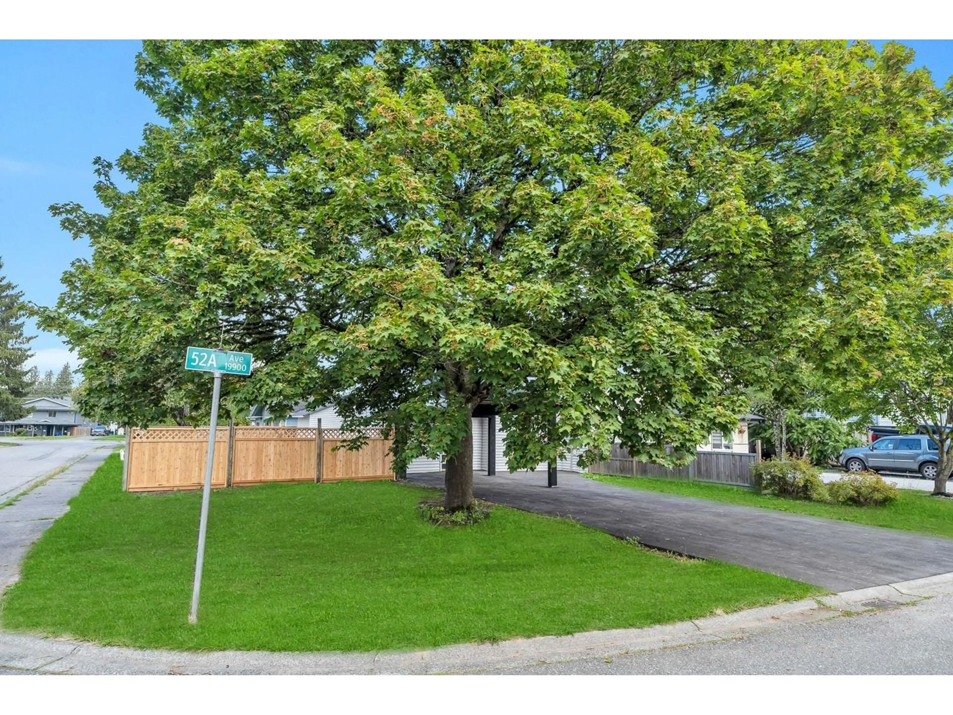 A pic from exterior of the house or condo, the street view for 19911 52A AVENUE, Langley British Columbia V3A6T2