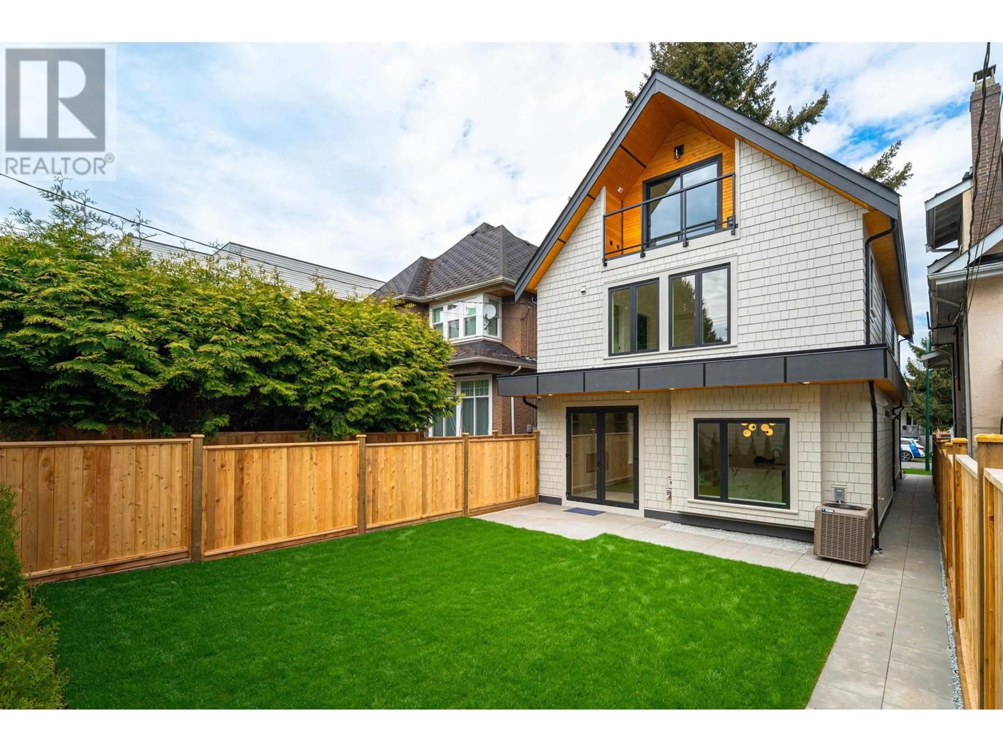 Frontside or backside of a home, the fenced backyard for 968 W 17TH AVENUE, Vancouver British Columbia V5Z1V4