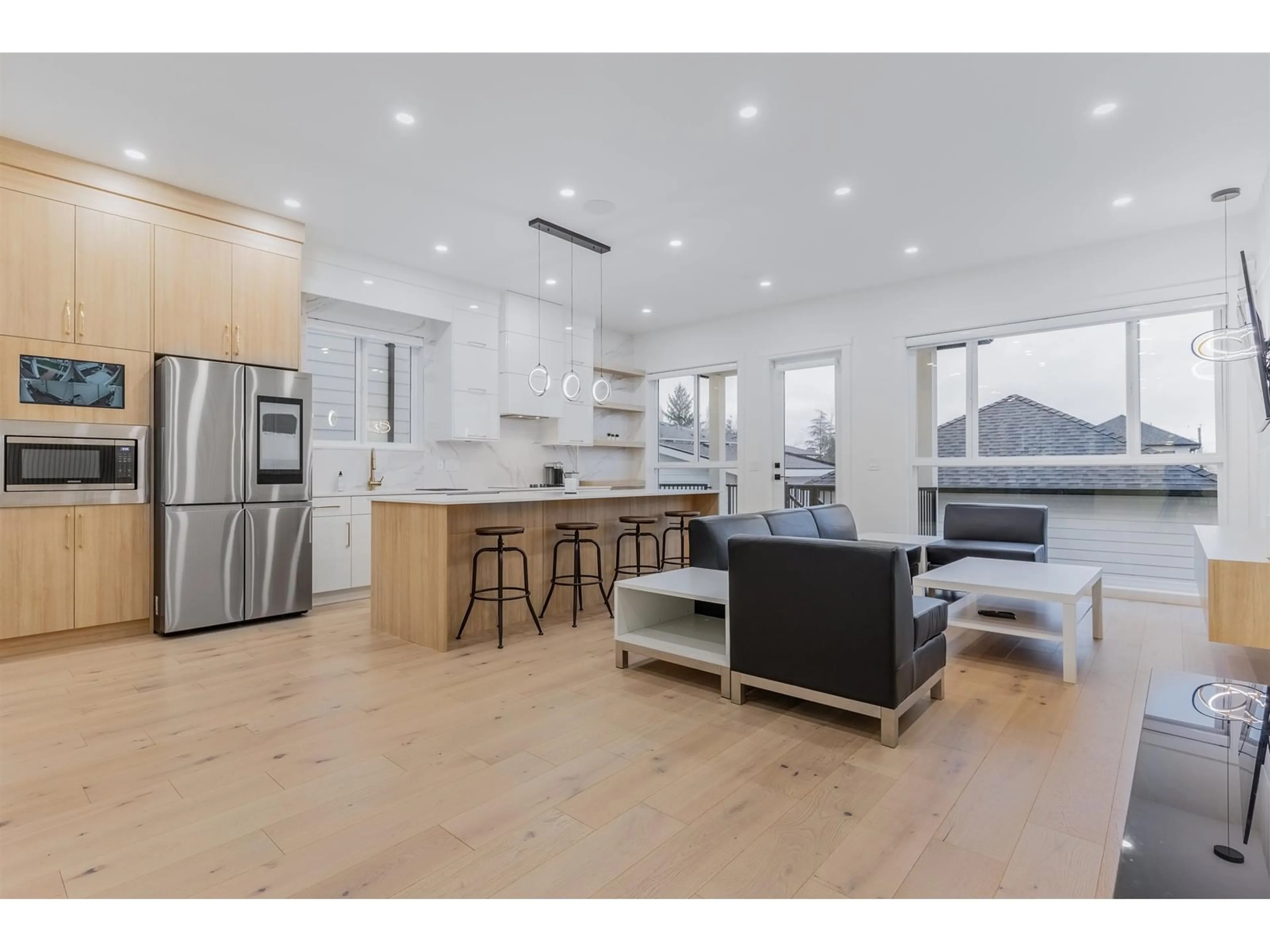 Open concept kitchen, wood/laminate floor for 16790 20A, Surrey British Columbia V3Z1H1