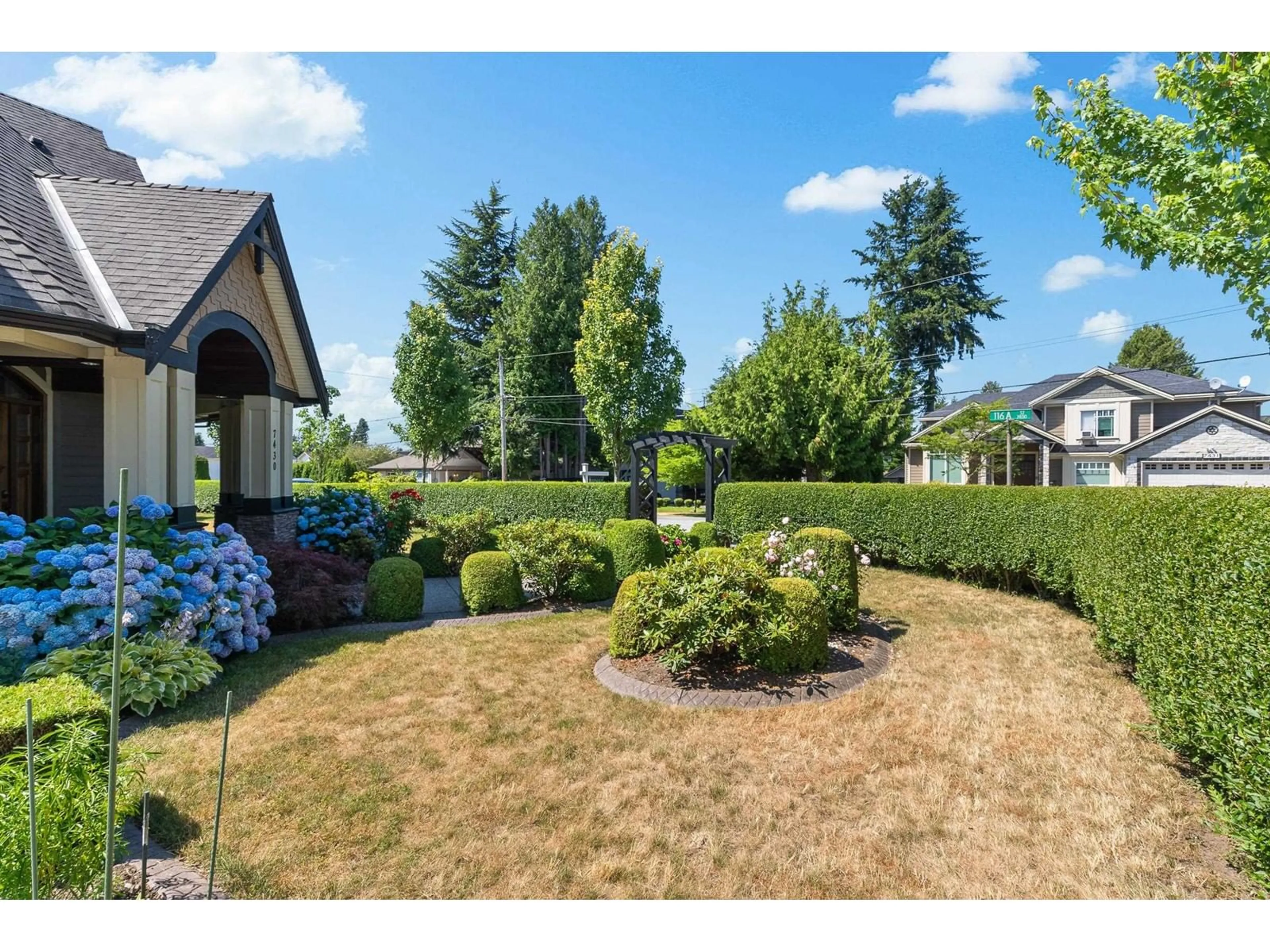 Frontside or backside of a home, the fenced backyard for 7430 116A STREET, Delta British Columbia V4C5X7