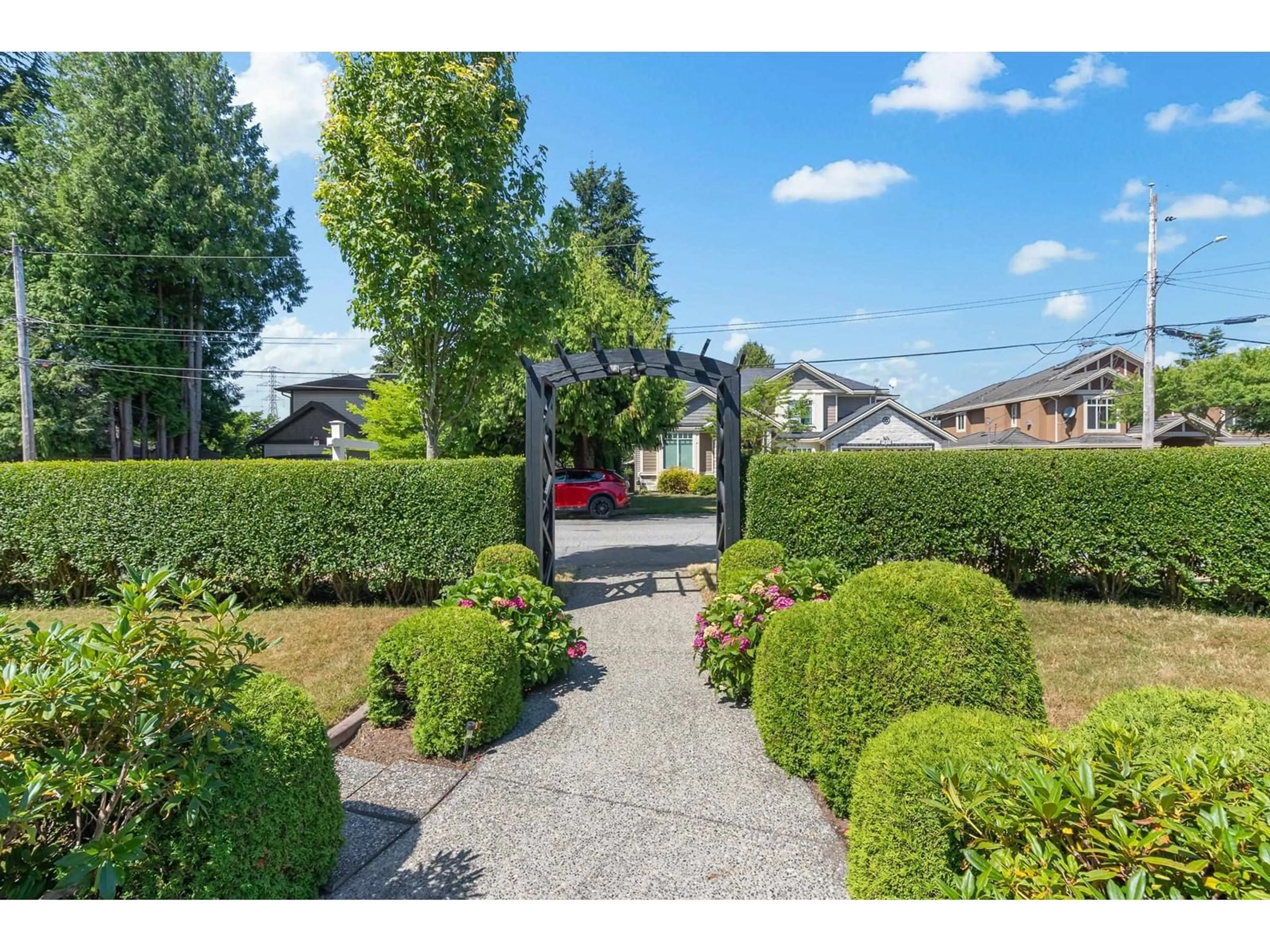 Frontside or backside of a home, the fenced backyard for 7430 116A STREET, Delta British Columbia V4C5X7