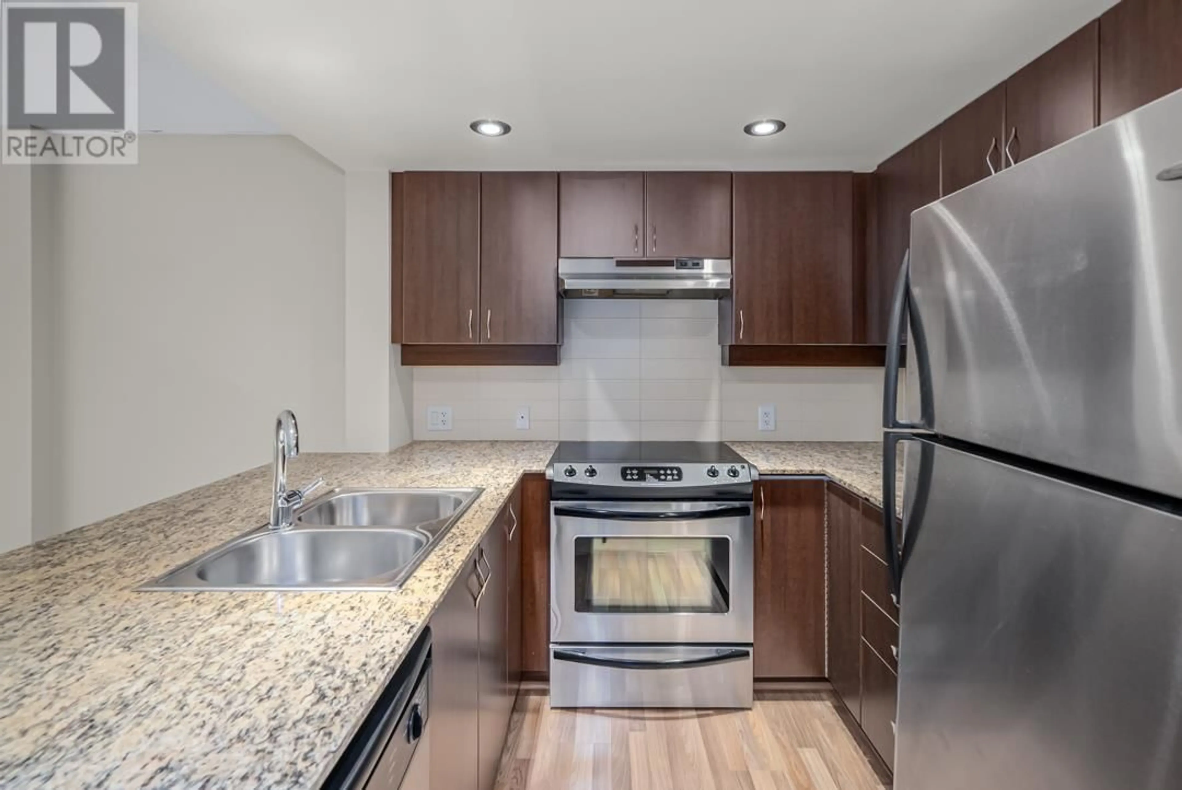 Standard kitchen, wood floors for 406 9232 UNIVERSITY CRESCENT, Burnaby British Columbia V5A0A3