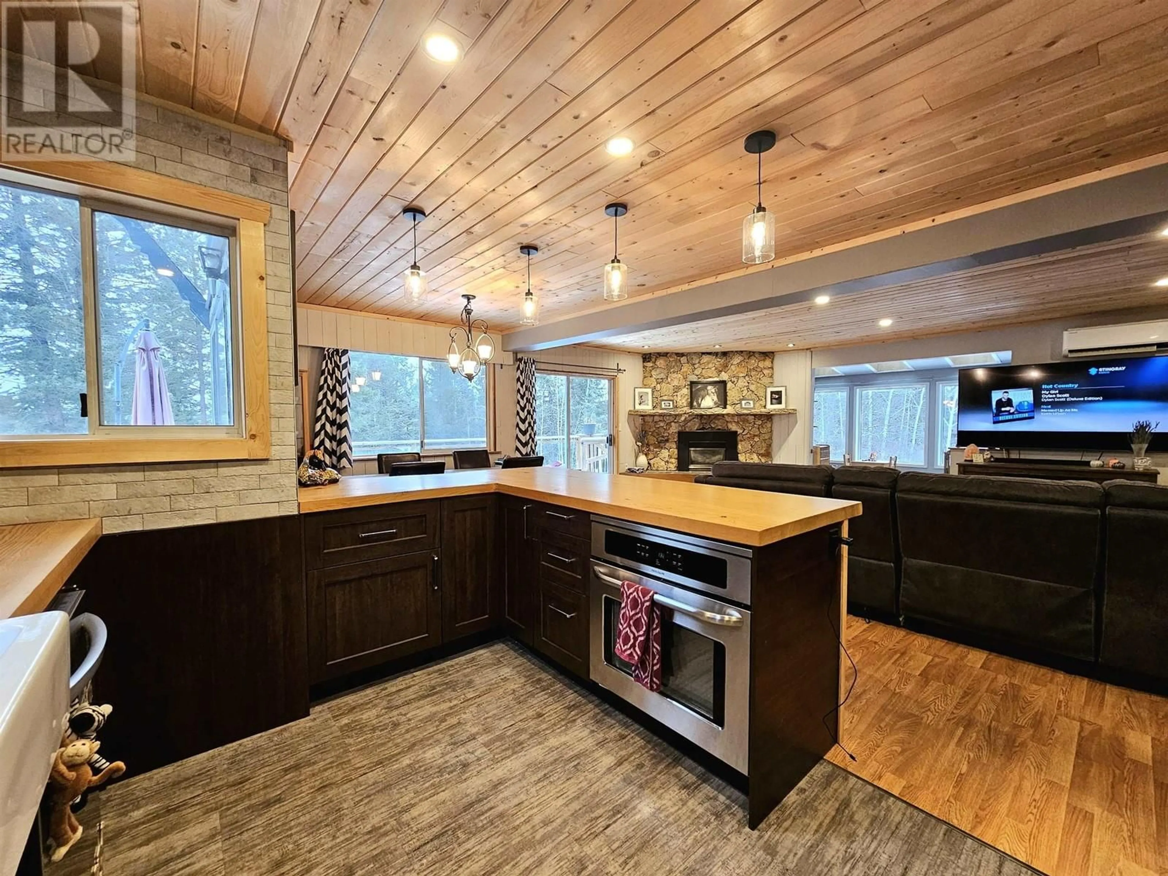 Rustic kitchen, wood floors, cottage for 4975 PLATEAU ROAD, 108 Mile Ranch British Columbia V0K2Z0