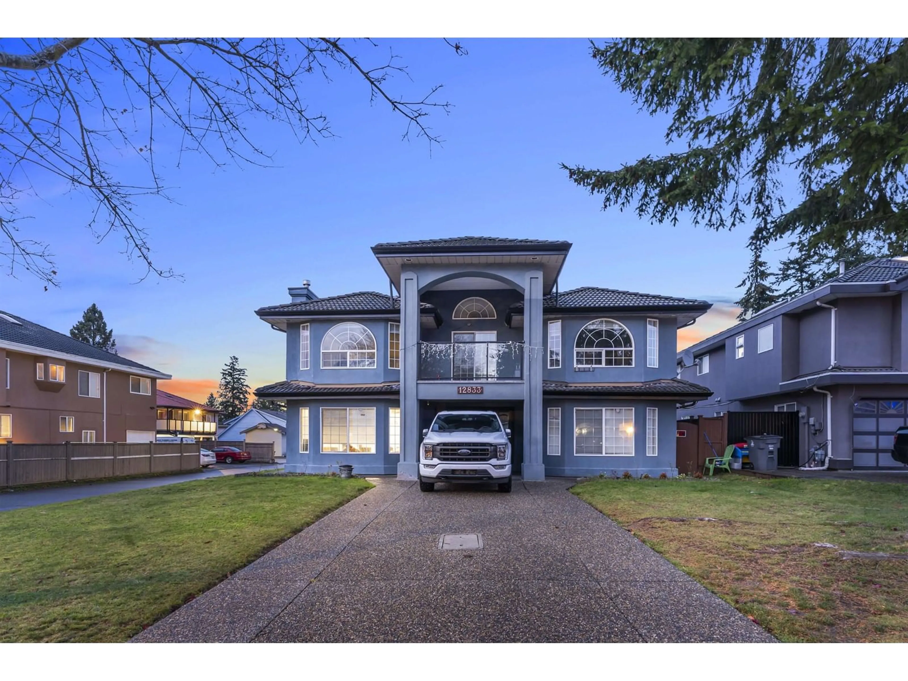 Frontside or backside of a home, the street view for 12833 65 AVENUE, Surrey British Columbia V3W9P4