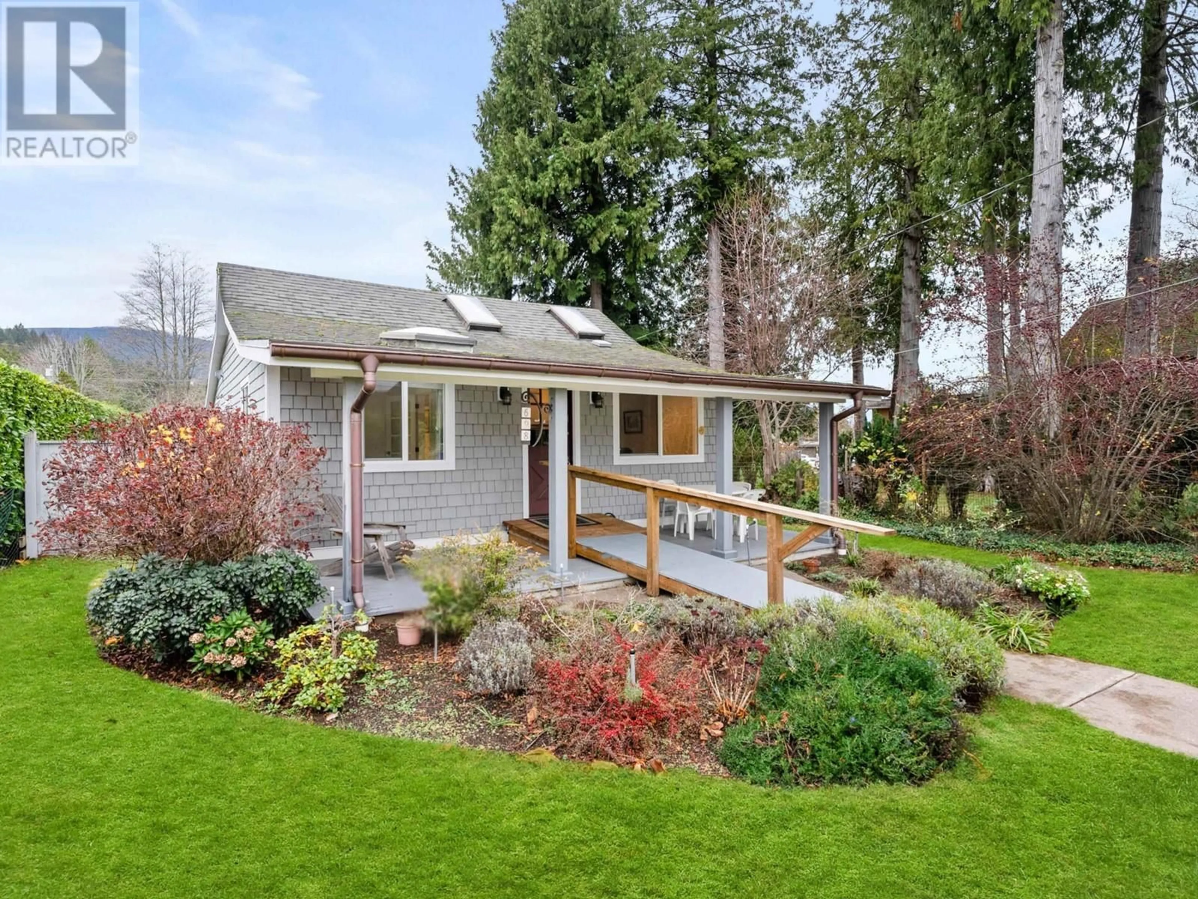 Frontside or backside of a home, the fenced backyard for 698 FRANKLIN ROAD, Gibsons British Columbia V0N1V8