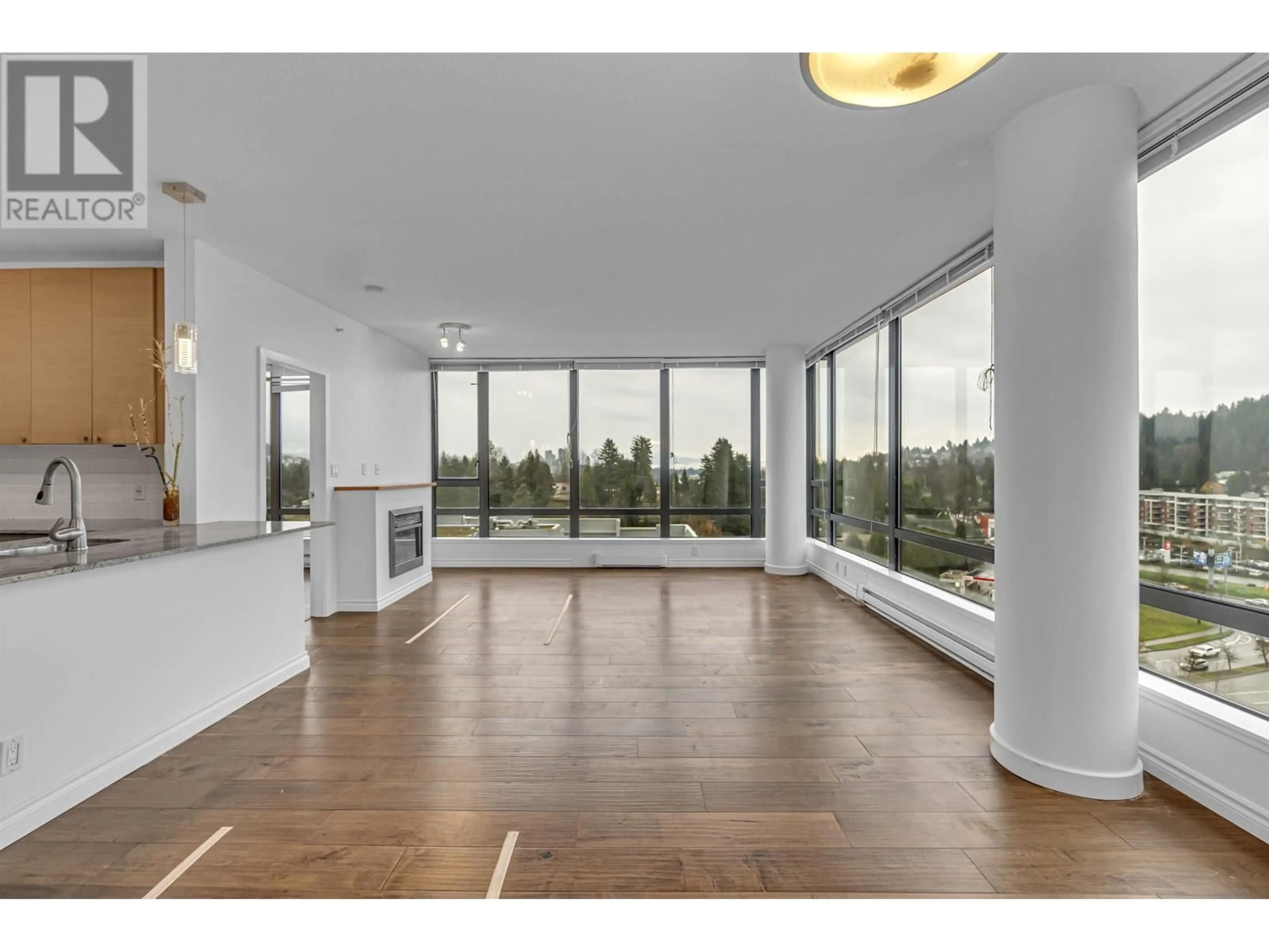 A pic of a room, wood floors for 1602 400 CAPILANO ROAD, Port Moody British Columbia V3H0E1