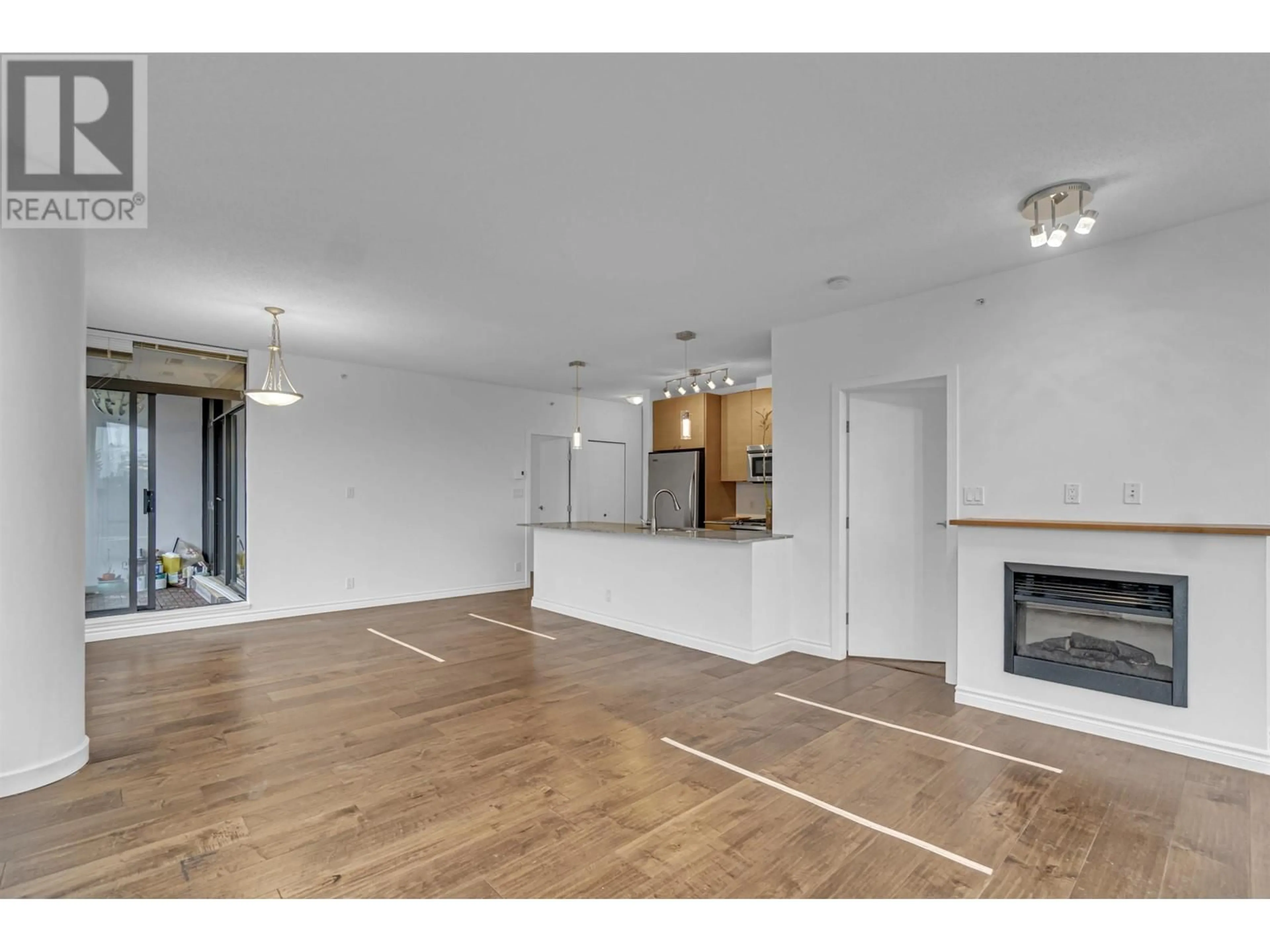 A pic of a room, wood floors for 1602 400 CAPILANO ROAD, Port Moody British Columbia V3H0E1