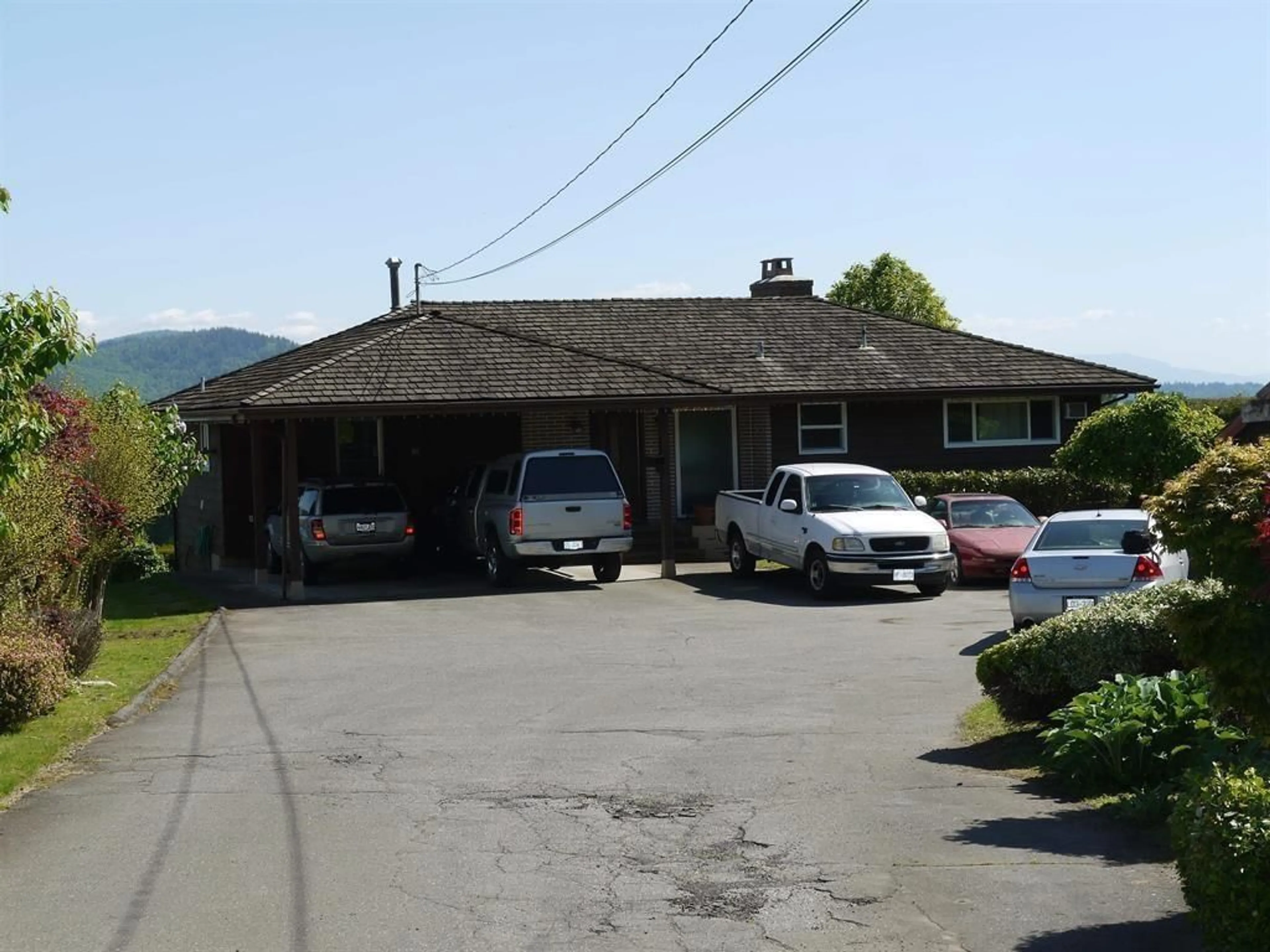 Frontside or backside of a home, the street view for 34534 DANN AVENUE, Mission British Columbia V2V6P6