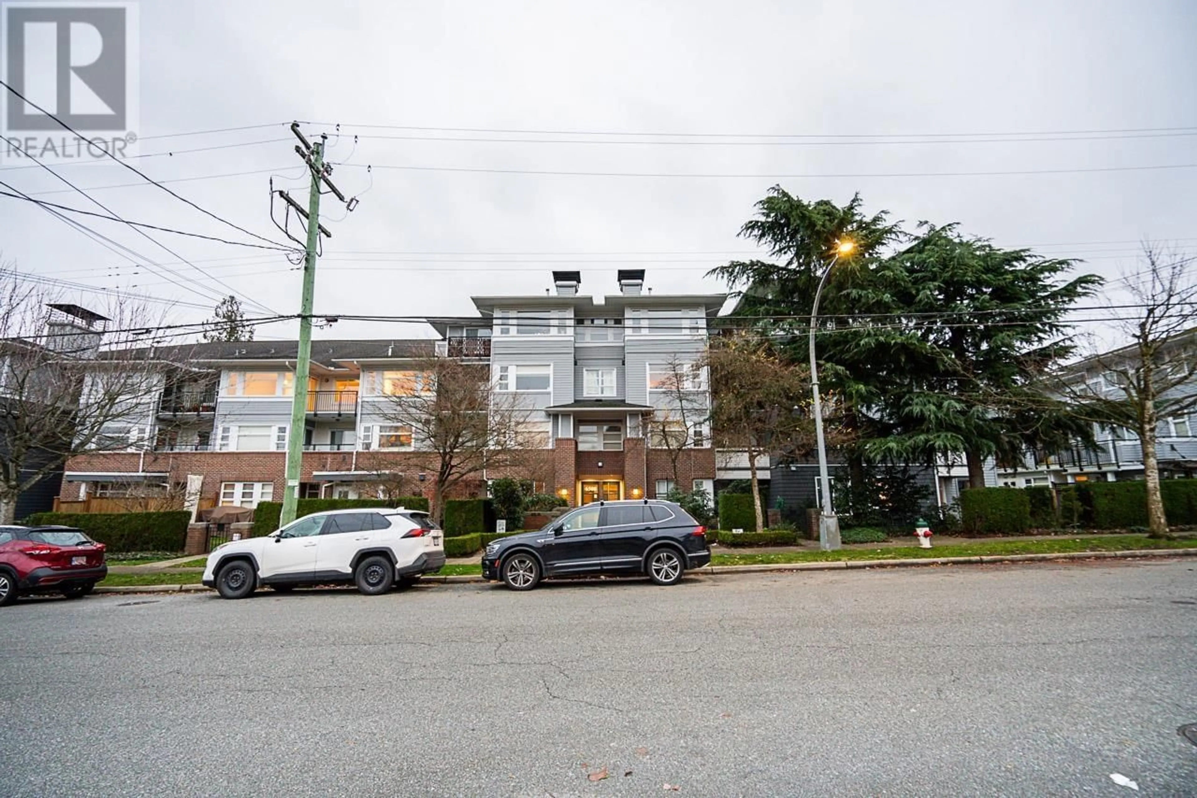 A pic from exterior of the house or condo, the street view for 315 6508 DENBIGH AVENUE, Burnaby British Columbia V5H4W6