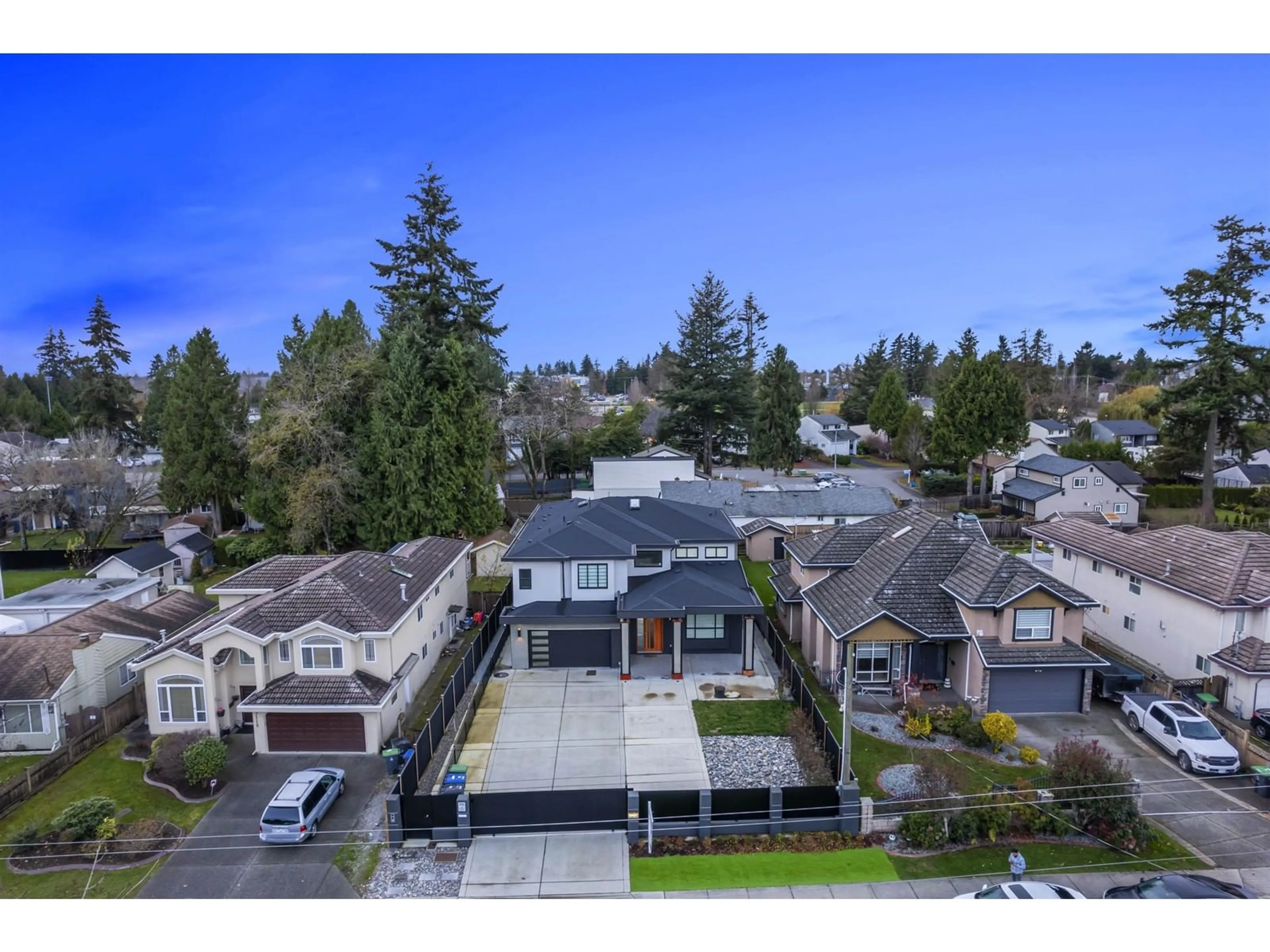 Frontside or backside of a home, the fenced backyard for 7125 130 STREET, Surrey British Columbia V3W4J6