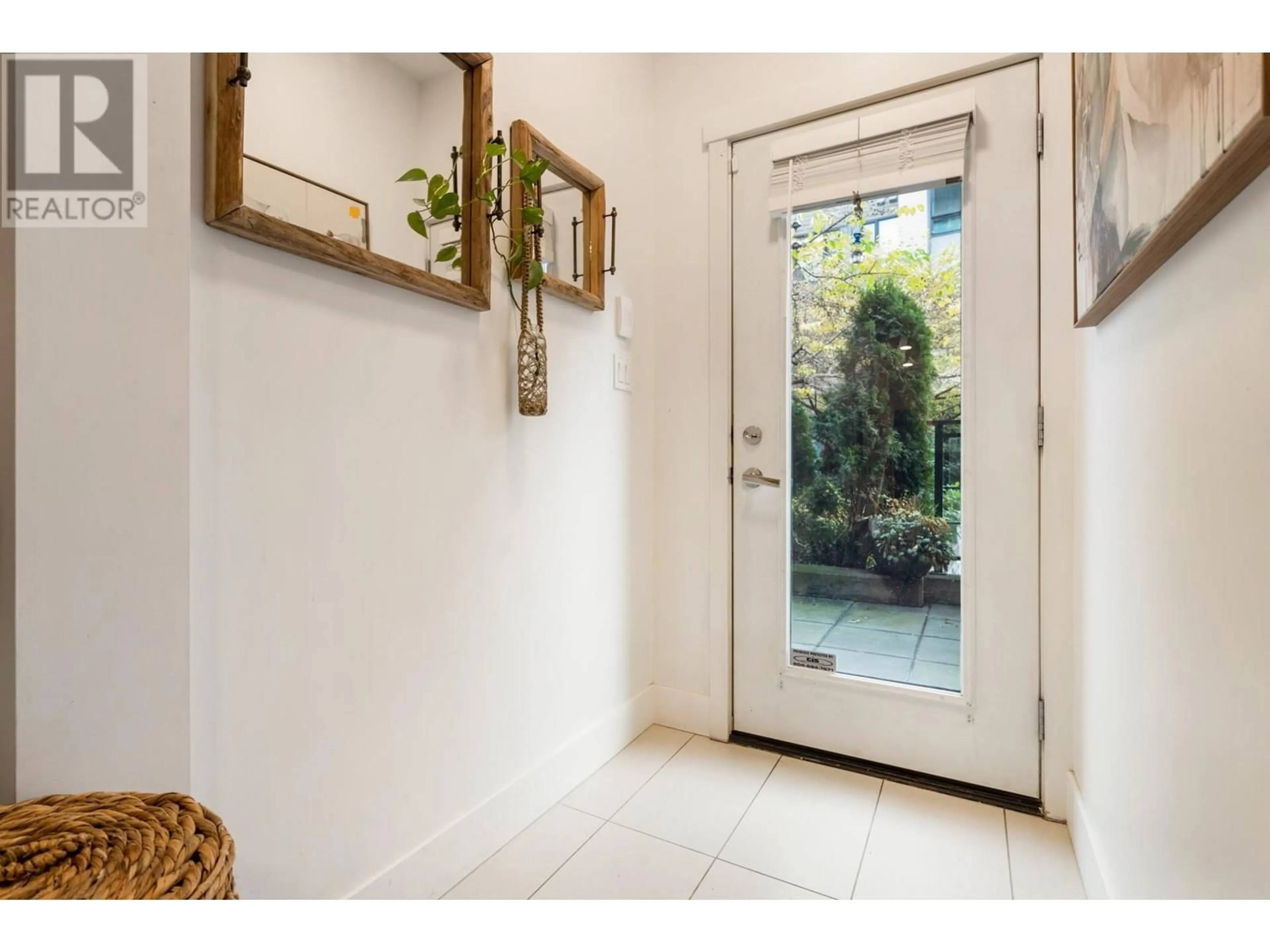 Indoor entryway, wood floors for 107 3133 RIVERWALK AVENUE, Vancouver British Columbia V5S0A7