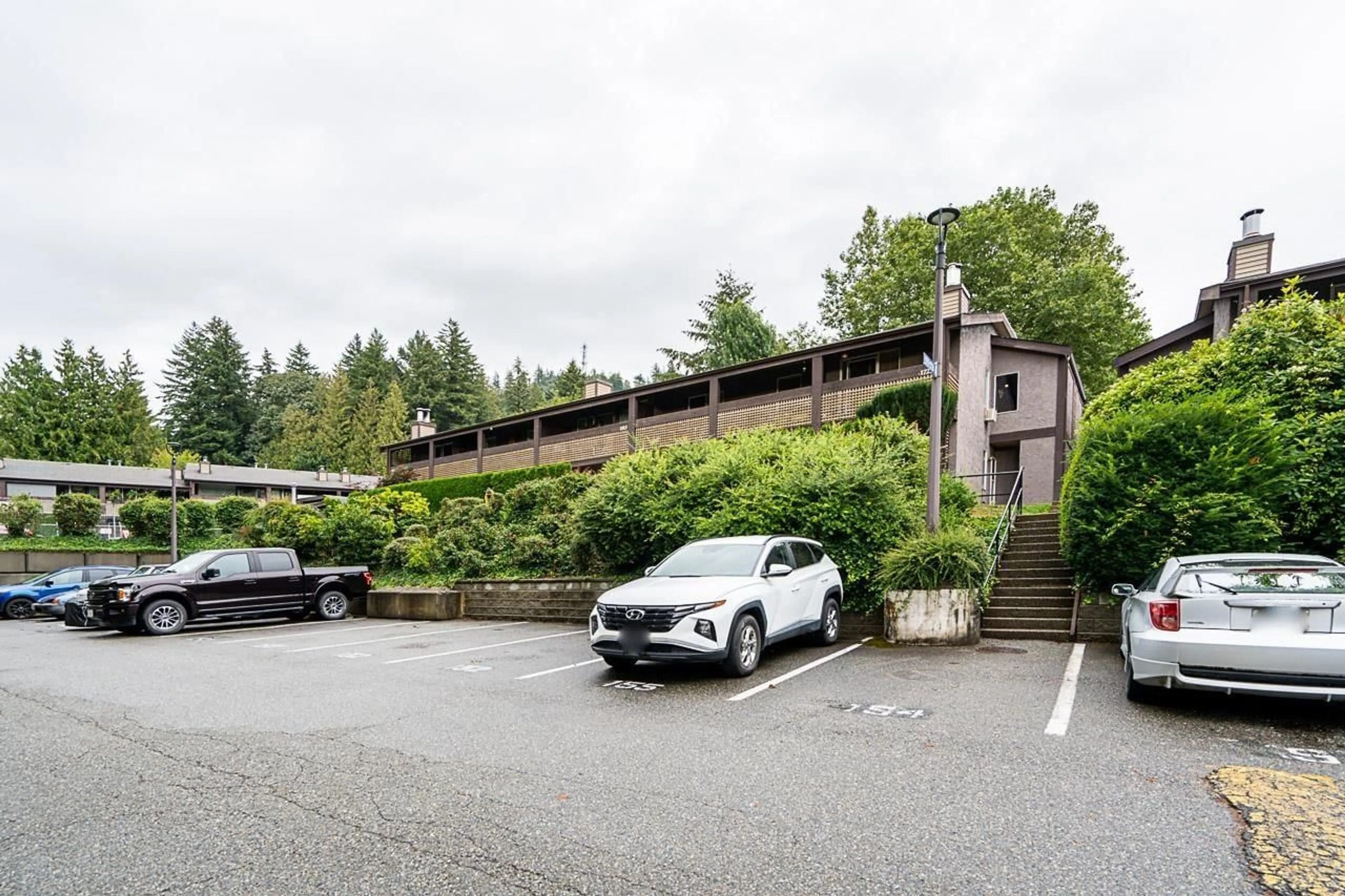 A pic from exterior of the house or condo, the street view for 1714 34909 OLD YALE ROAD, Abbotsford British Columbia V3G2E7