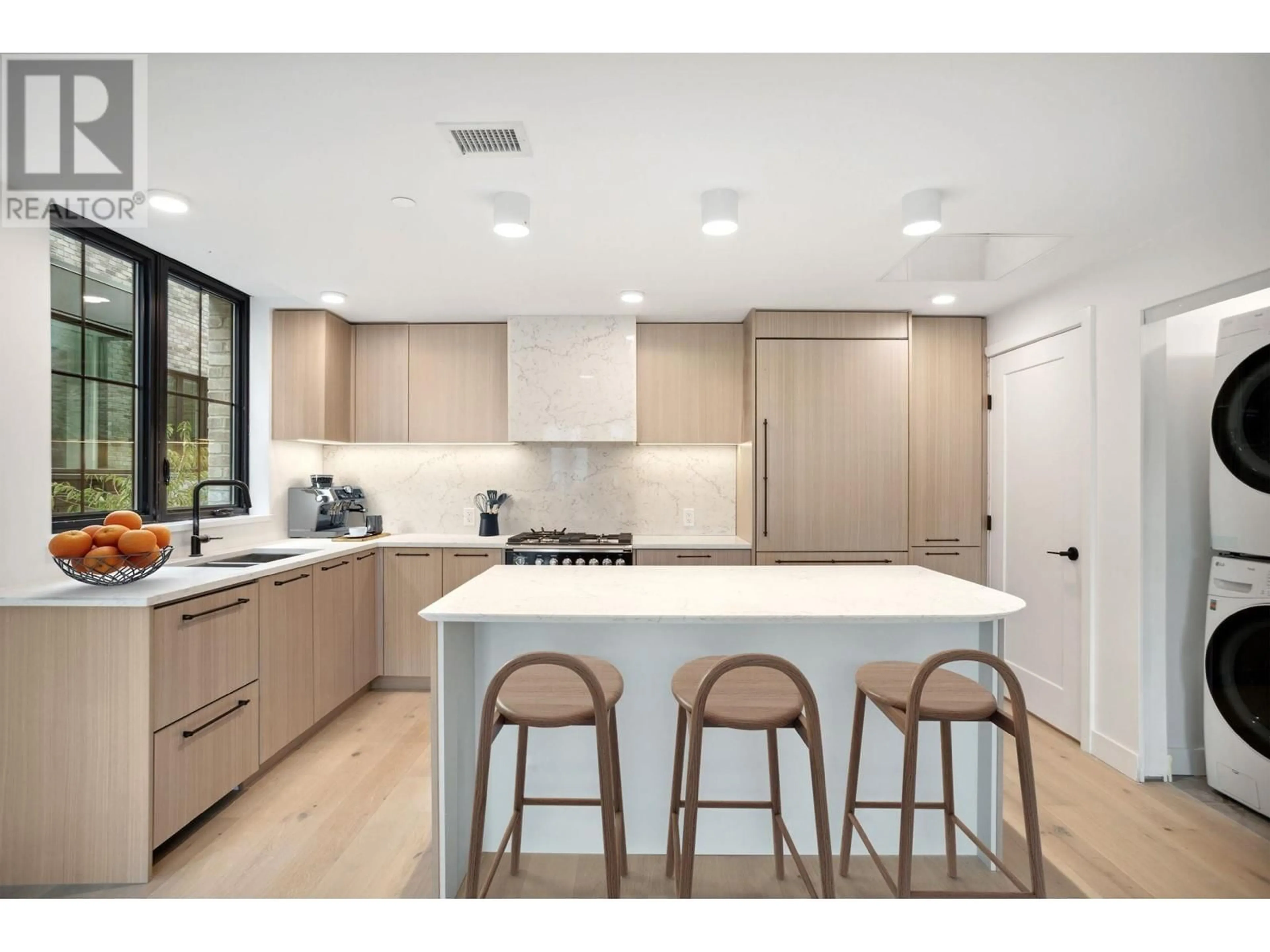 Contemporary kitchen, wood floors for 101 157 W KING EDWARD AVENUE, Vancouver British Columbia V5Y2H8