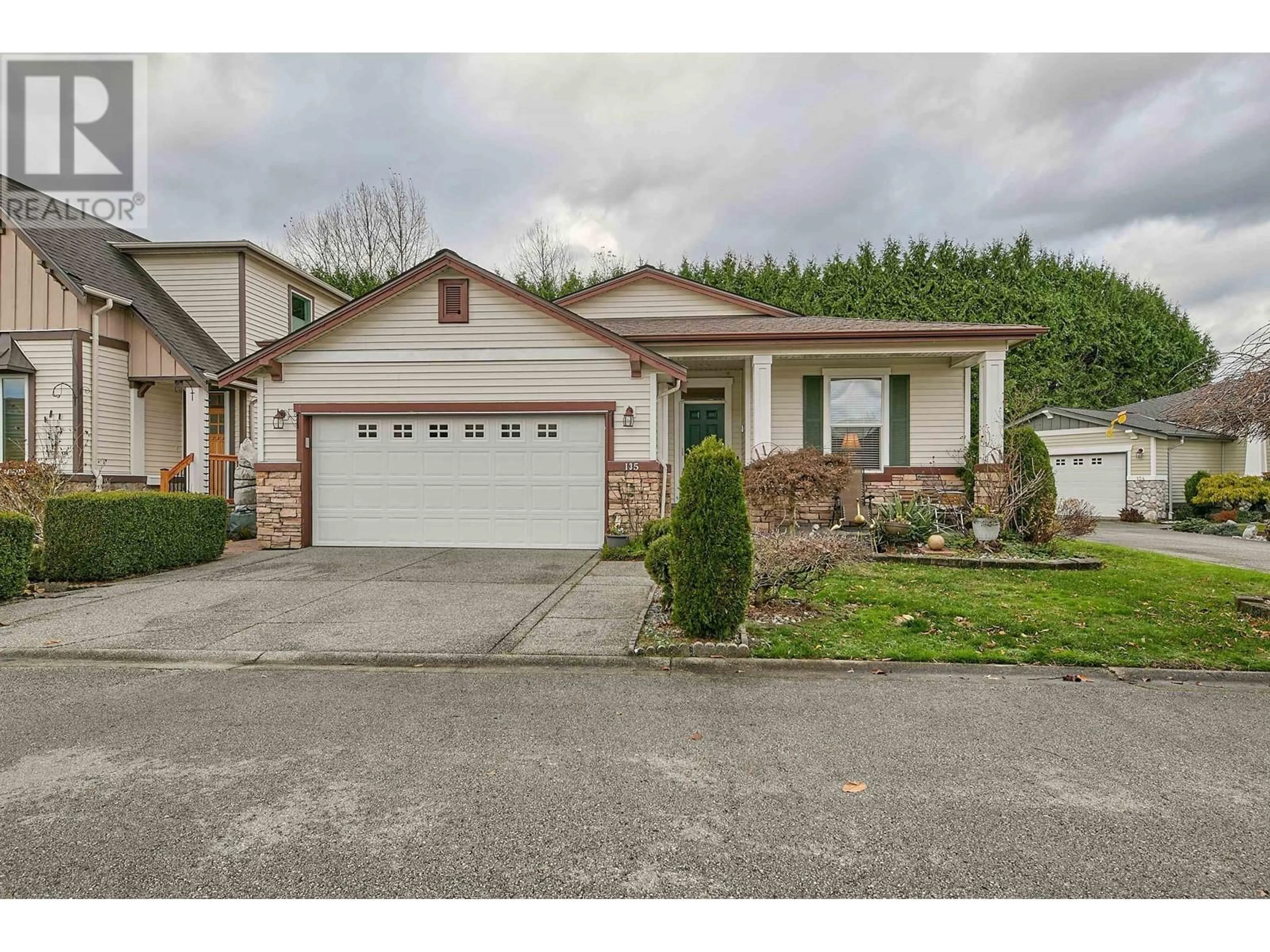 Frontside or backside of a home, the street view for 135 19639 MEADOW GARDENS WAY, Pitt Meadows British Columbia V3Y2T5