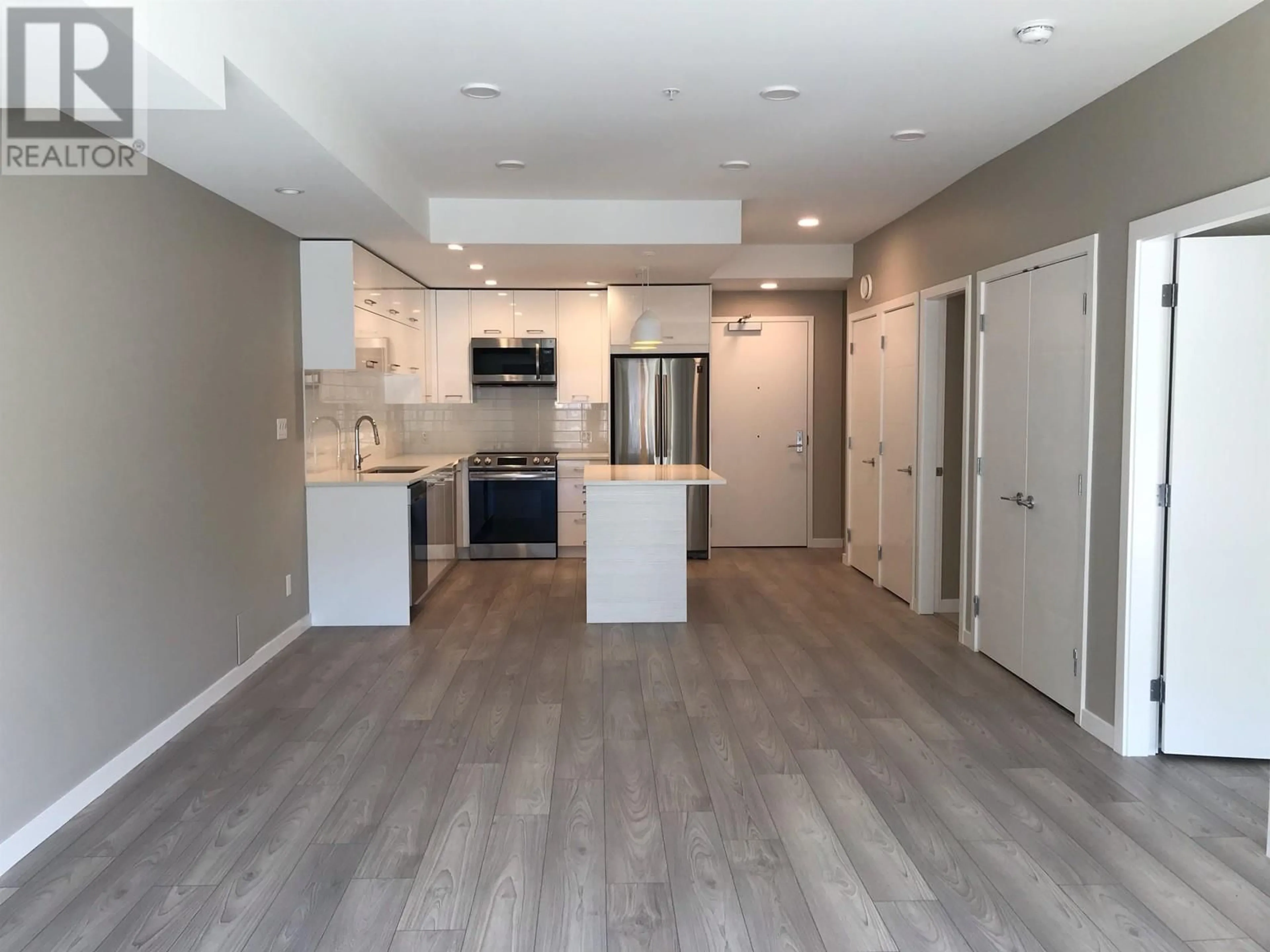 Open concept kitchen for 506 38033 SECOND AVENUE, Squamish British Columbia V8B0C4