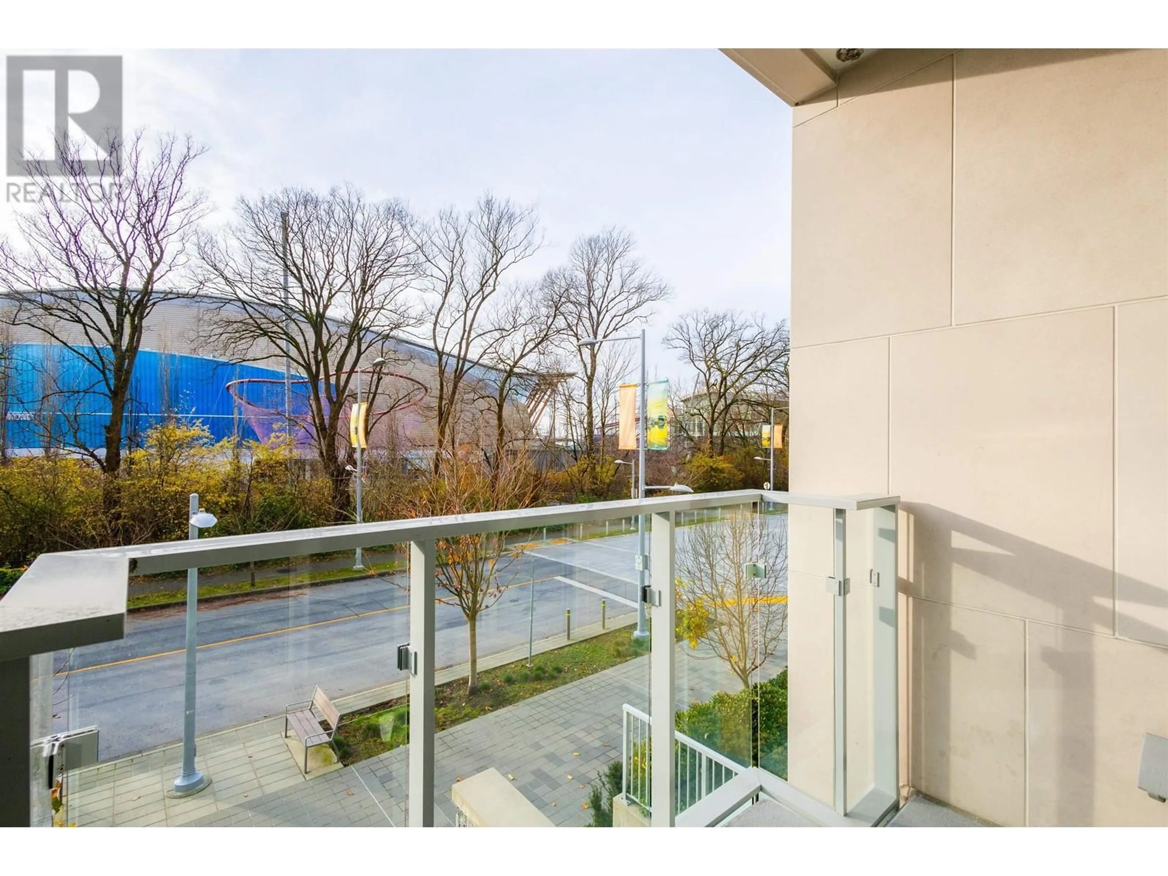 Balcony in the apartment, the fenced backyard for 104 6622 PEARSON WAY, Richmond British Columbia V7C0E4