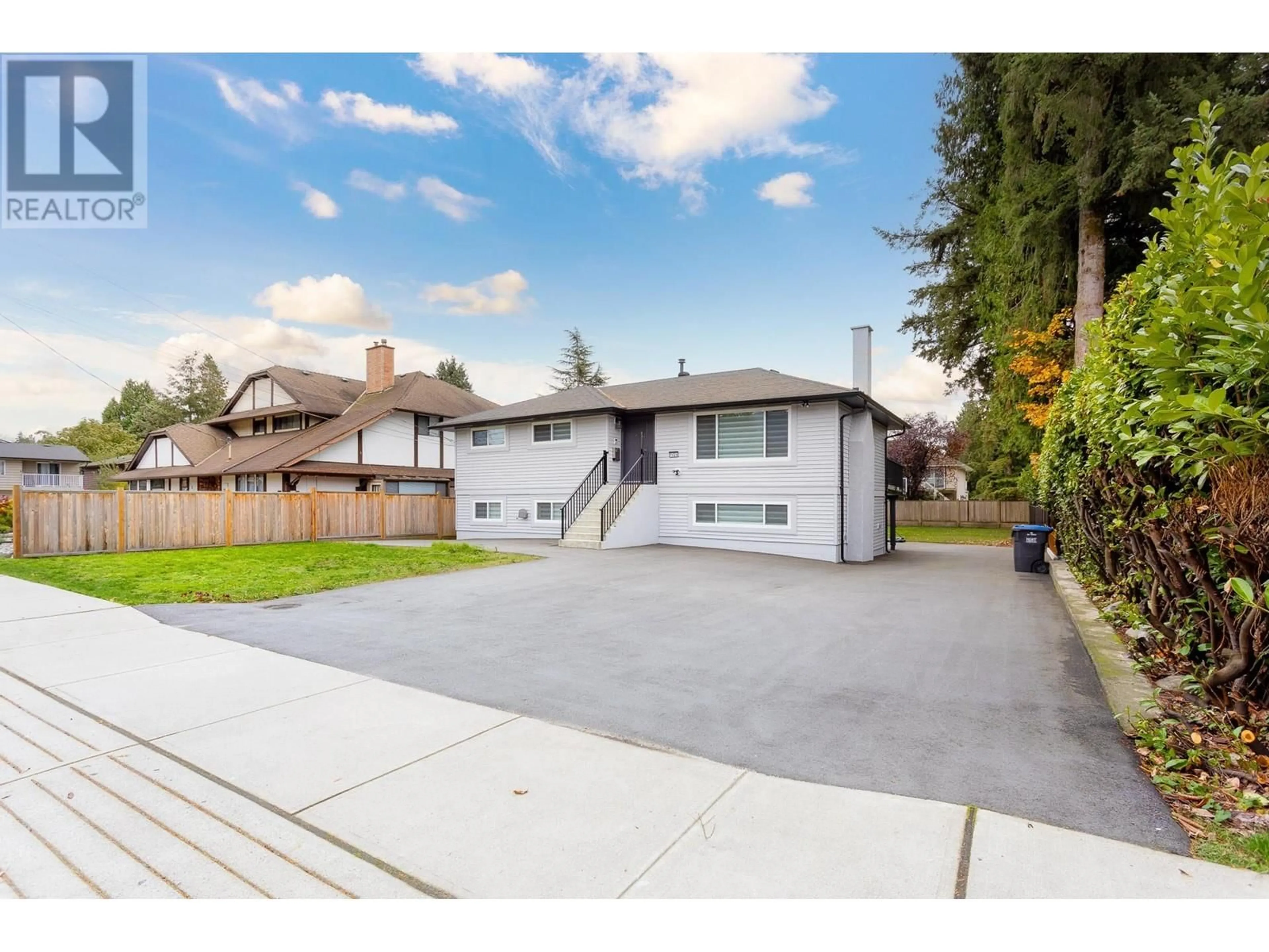 Frontside or backside of a home, the fenced backyard for 1624 COQUITLAM AVENUE, Port Coquitlam British Columbia V3B1H7