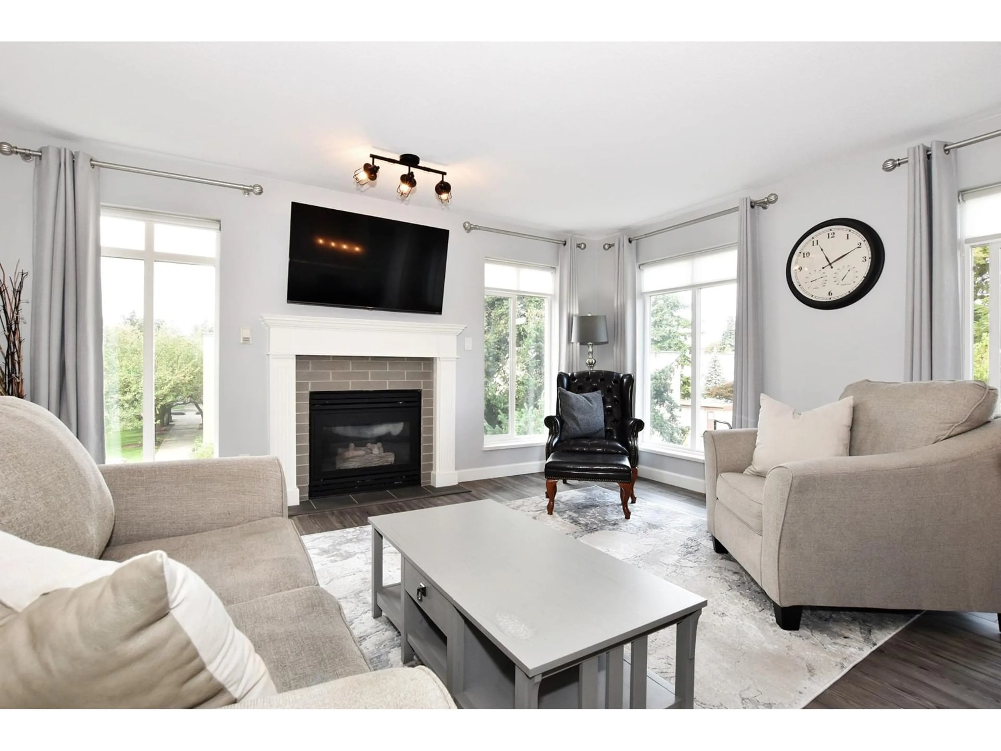 Living room, wood floors for 309 32075 GEORGE FERGUSON WAY, Abbotsford British Columbia V2T2K7