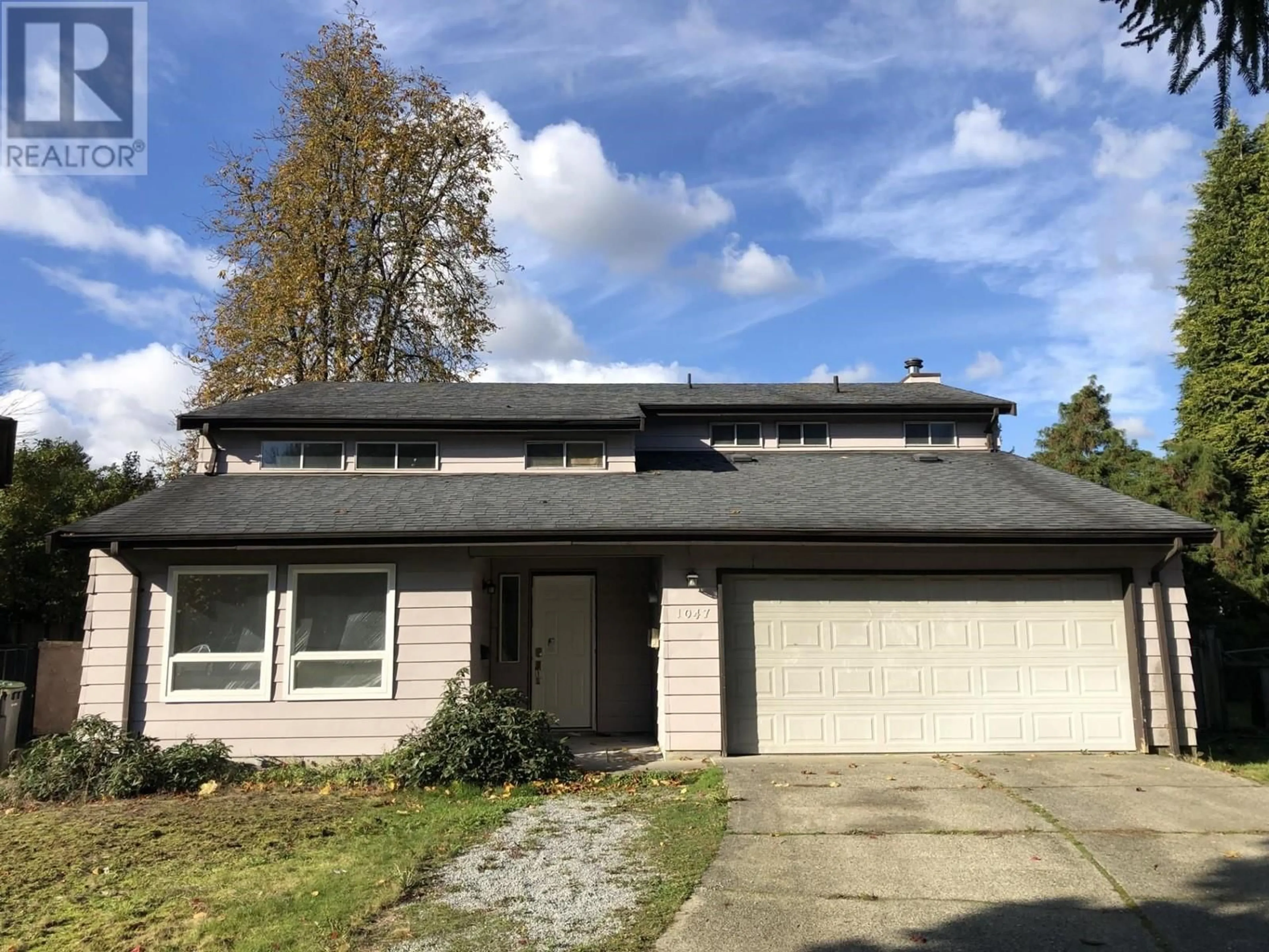 Frontside or backside of a home, the street view for 1047 CORNWALL DRIVE, Port Coquitlam British Columbia V3B5X2