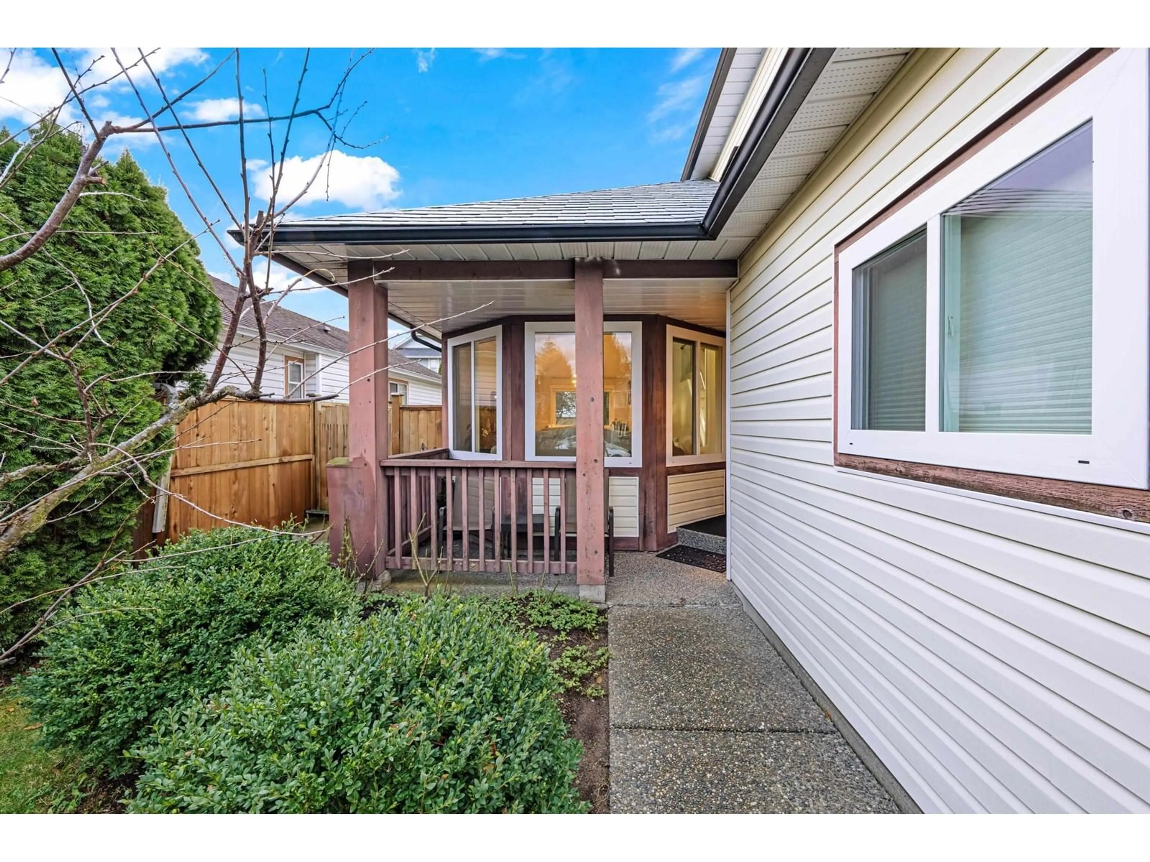 Frontside or backside of a home, the fenced backyard for 9673 151B STREET, Surrey British Columbia V3R9W7