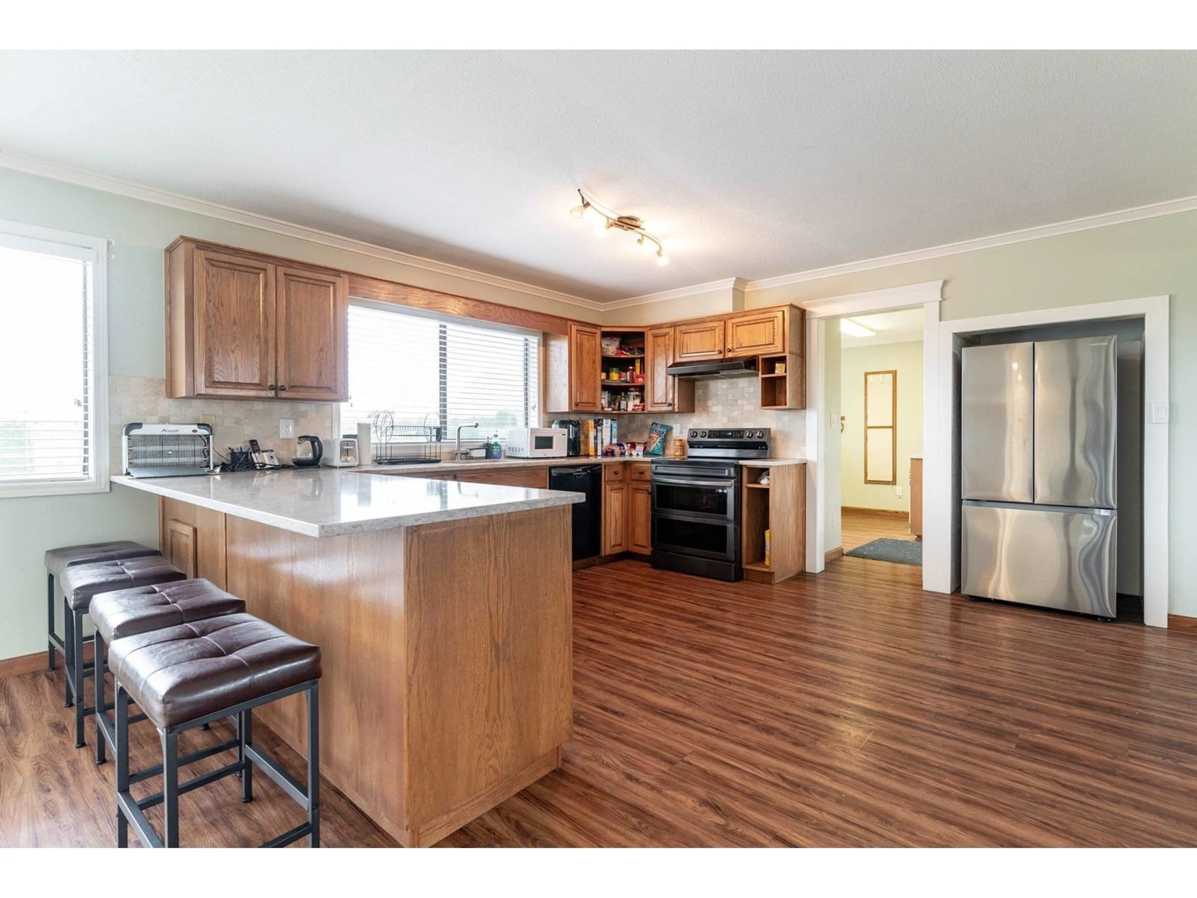 Open concept kitchen for 21787 MAXWELL CRESCENT, Langley British Columbia V2Y0W9