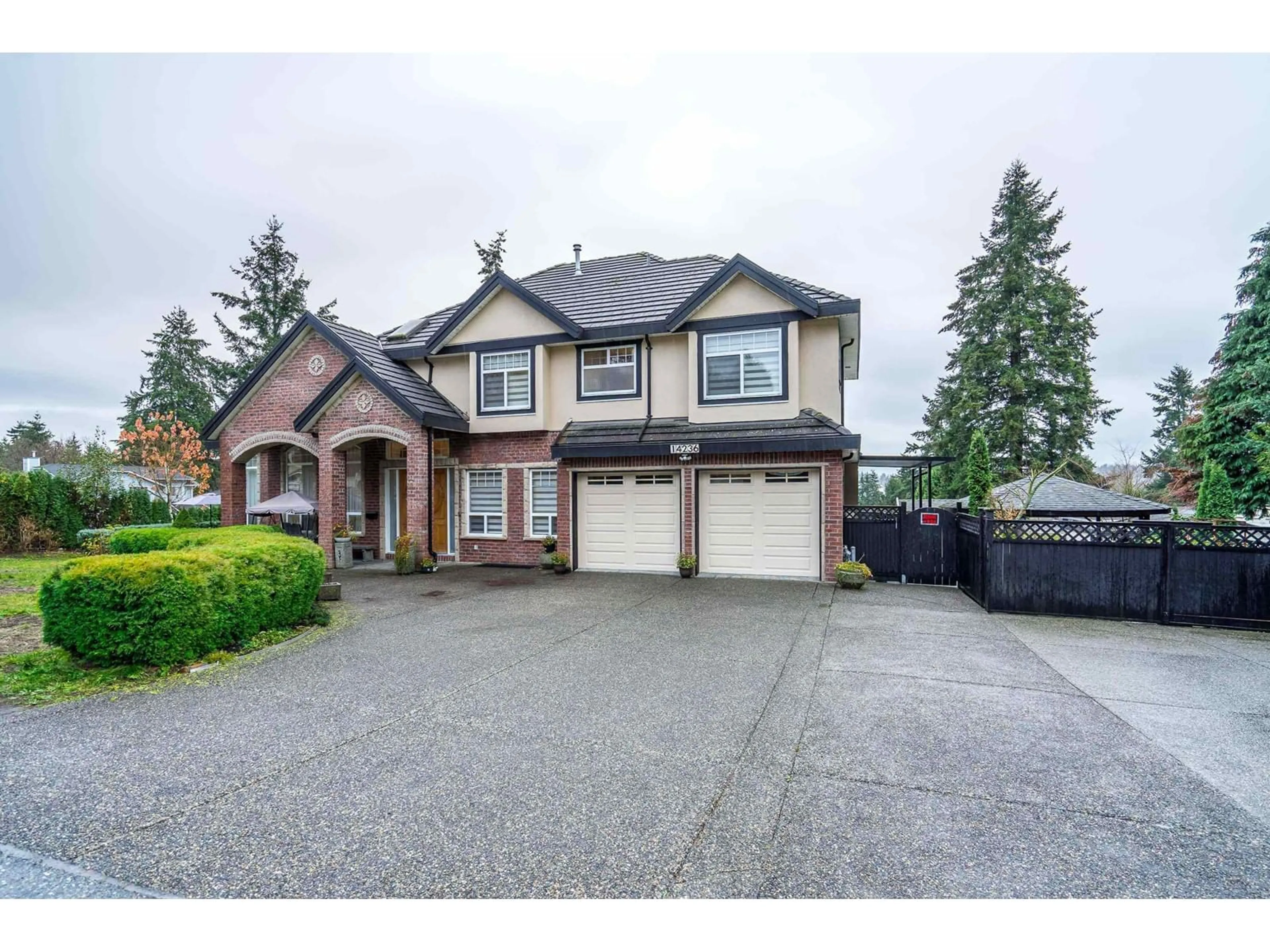 Frontside or backside of a home, the street view for 14236 69 AVENUE, Surrey British Columbia V3W2H7