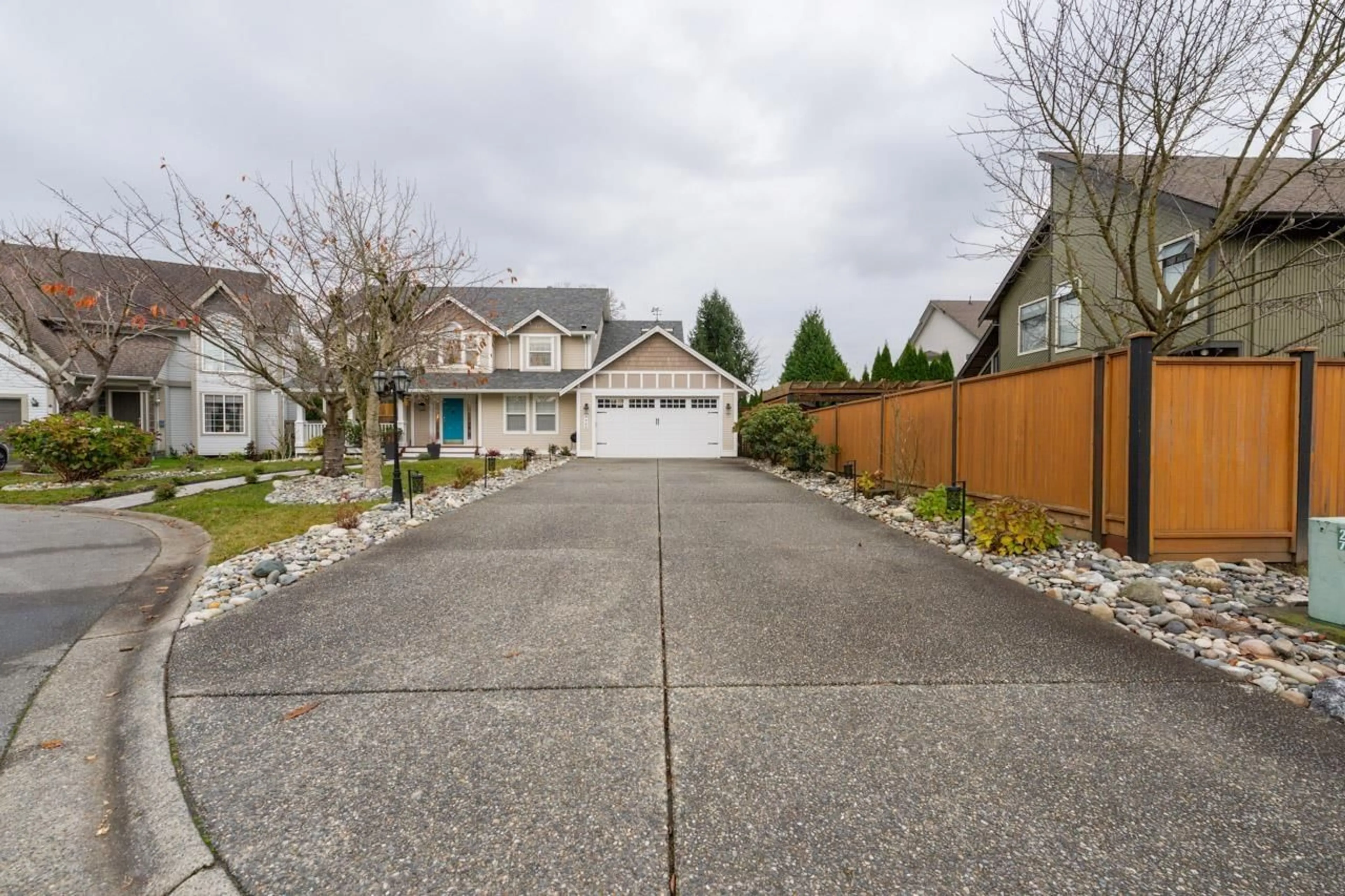 Frontside or backside of a home, the street view for 4442 209B STREET, Langley British Columbia V3A8Y8