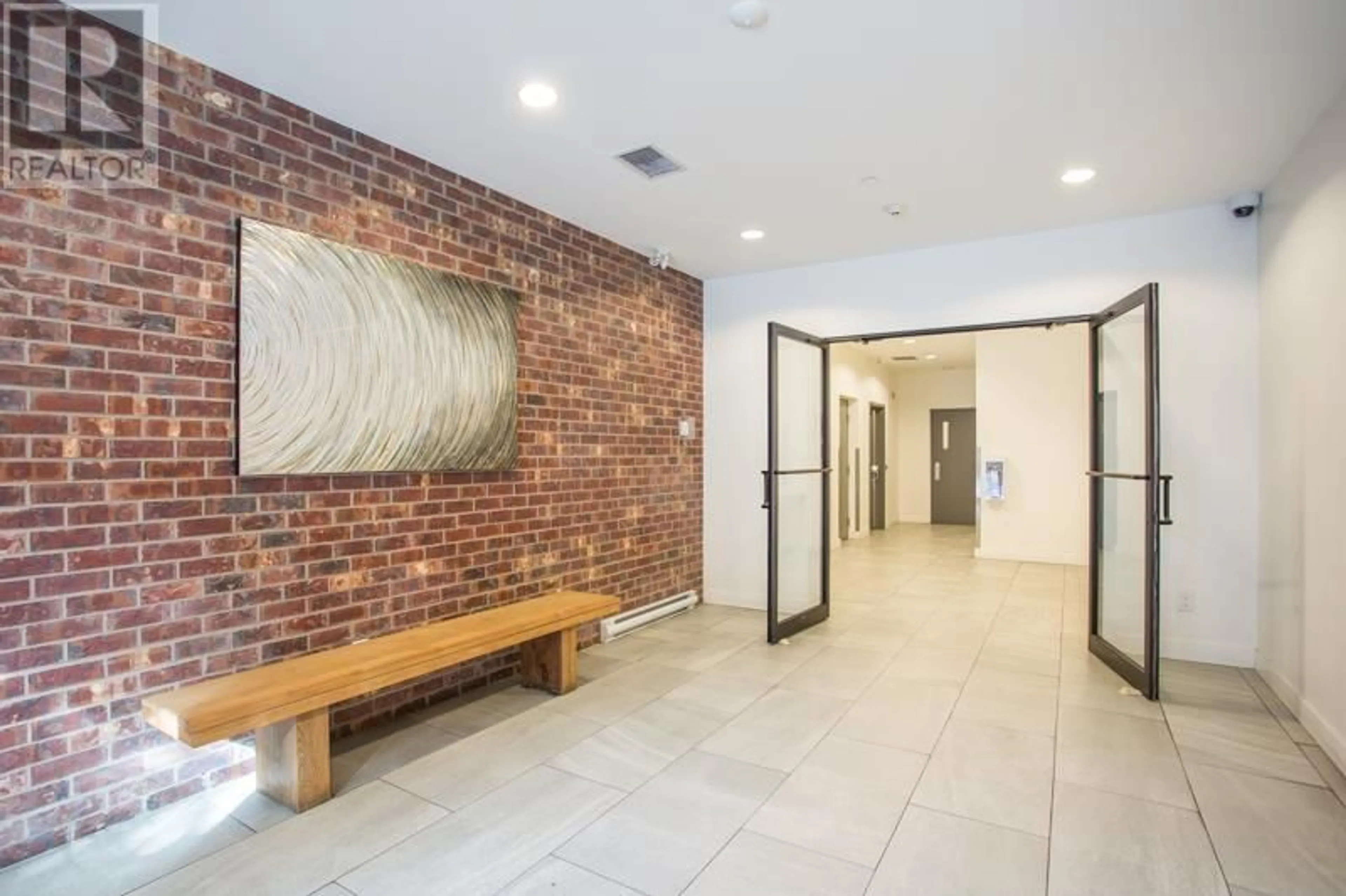 Indoor foyer, cement floor for 207 2141 E HASTINGS STREET, Vancouver British Columbia V5L1V2