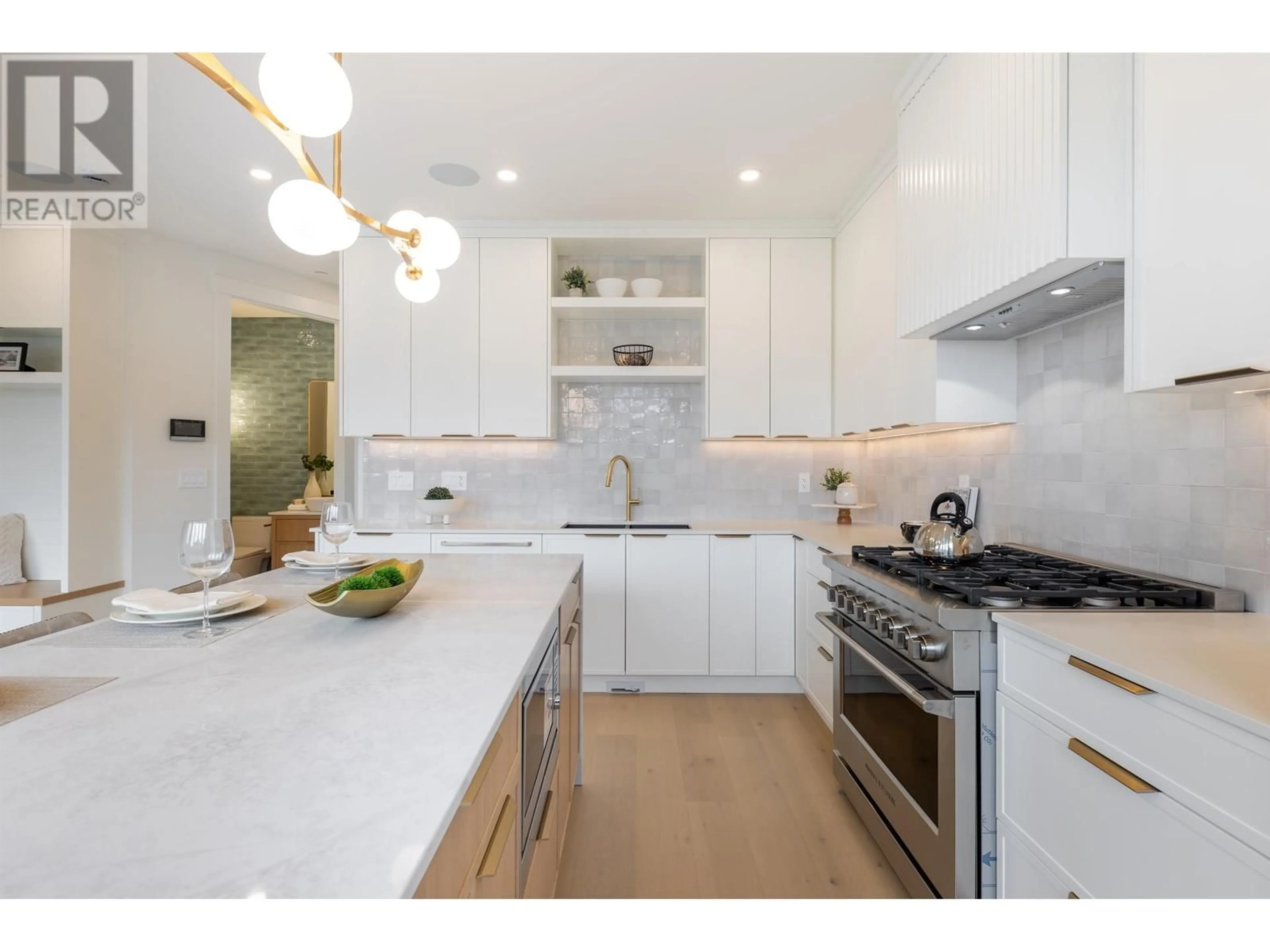 Contemporary kitchen, wood floors for 2 4769 COMMERCIAL STREET, Vancouver British Columbia V5N4G8