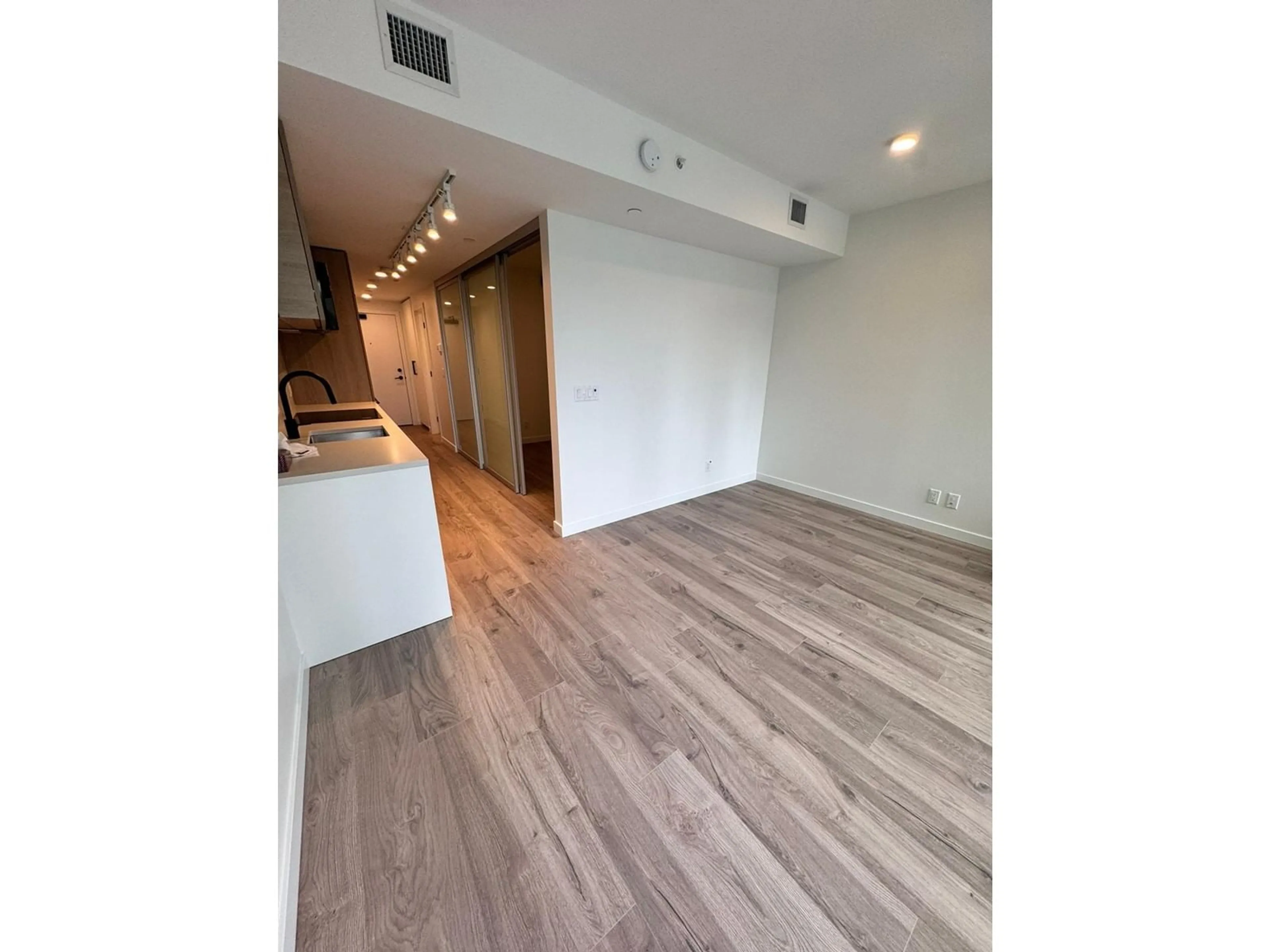 A pic of a room, wood floors for 509 13428 105 AVENUE, Surrey British Columbia V3T0S6