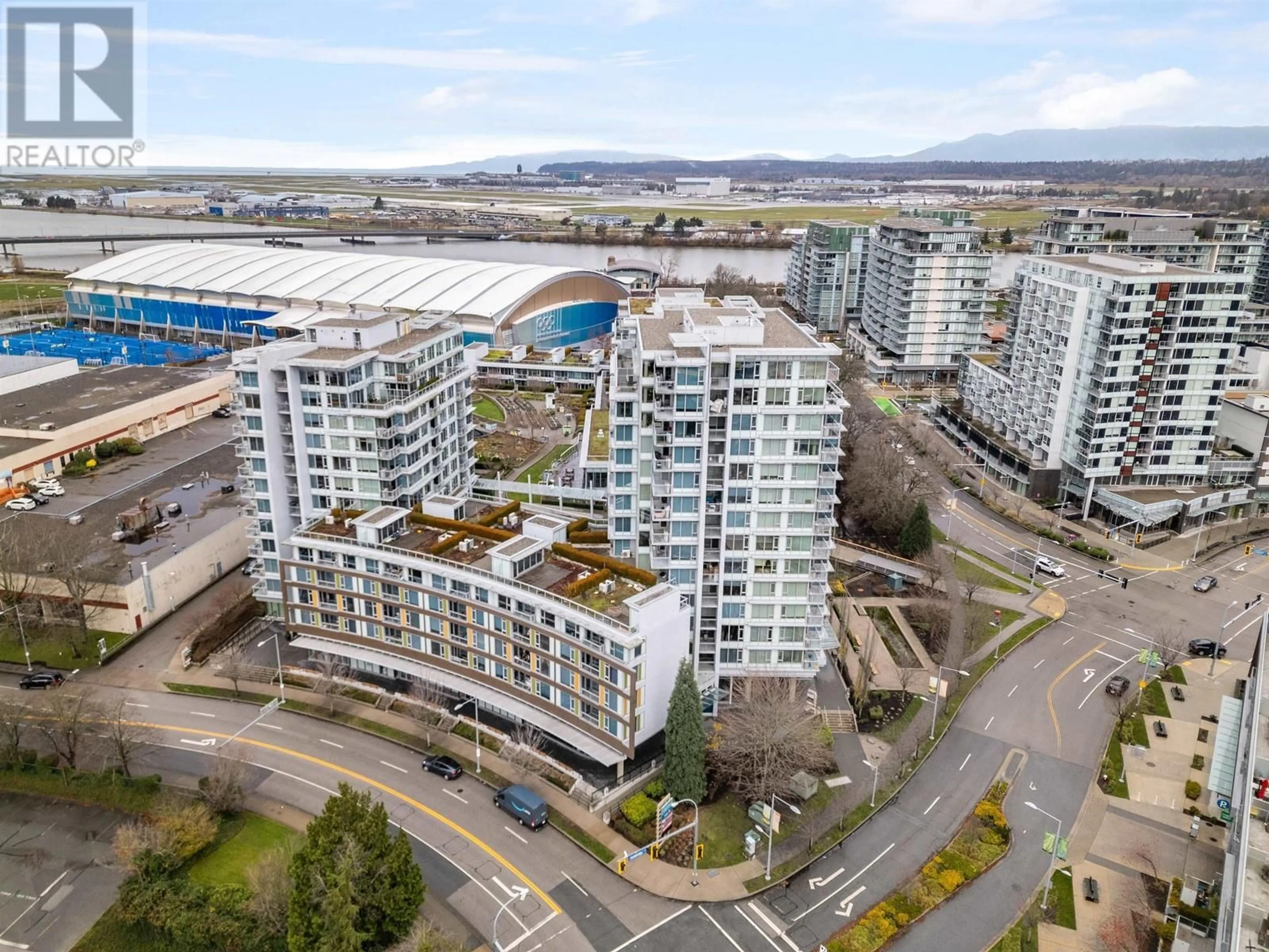 A pic from exterior of the house or condo, the view of city buildings for 1206 6971 ELMBRIDGE WAY, Richmond British Columbia V7C0A5